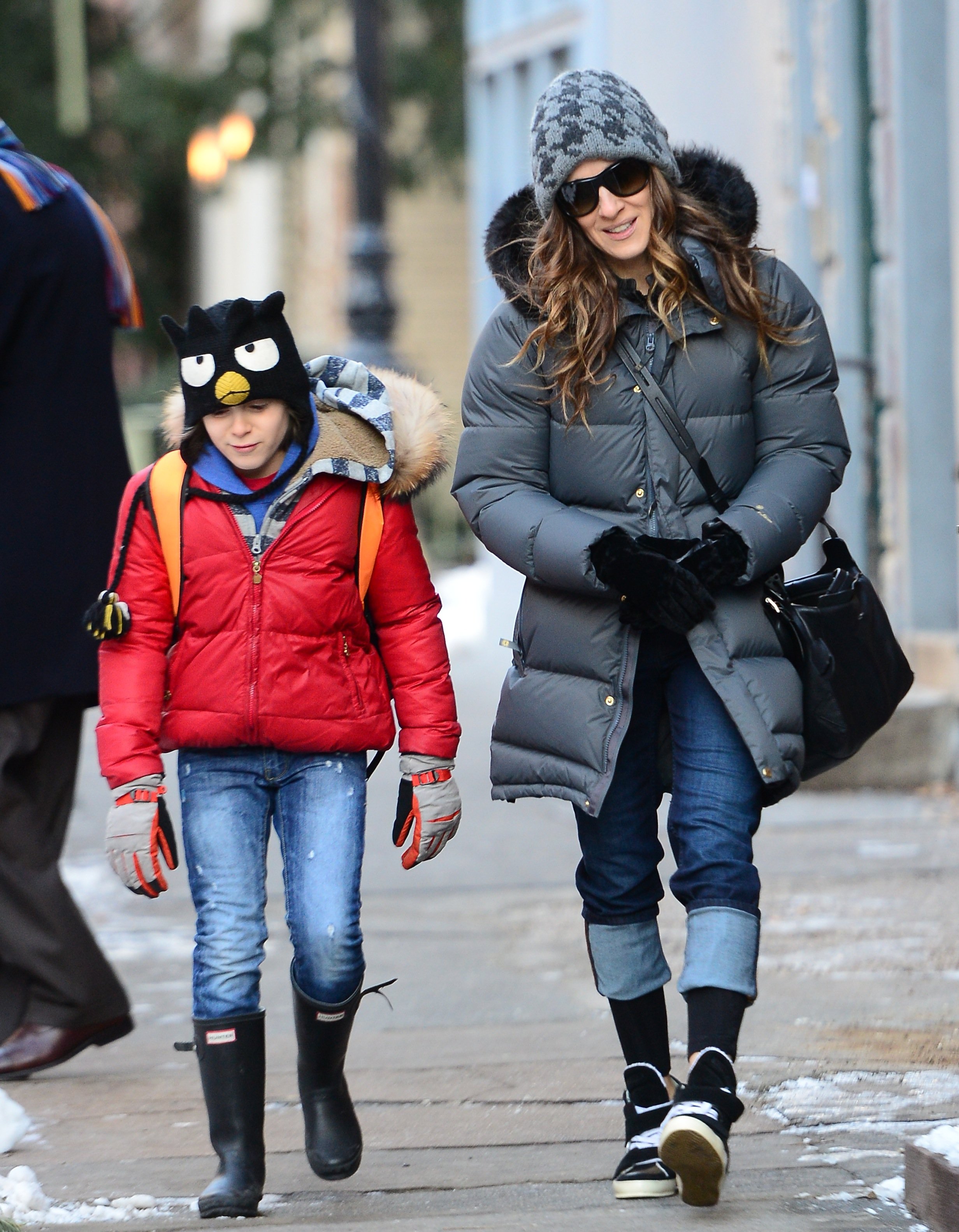 Sarah Jessica Parker taking a walk with her son James Wilkie Broderick on February 12, 2014 | Source: Getty Images