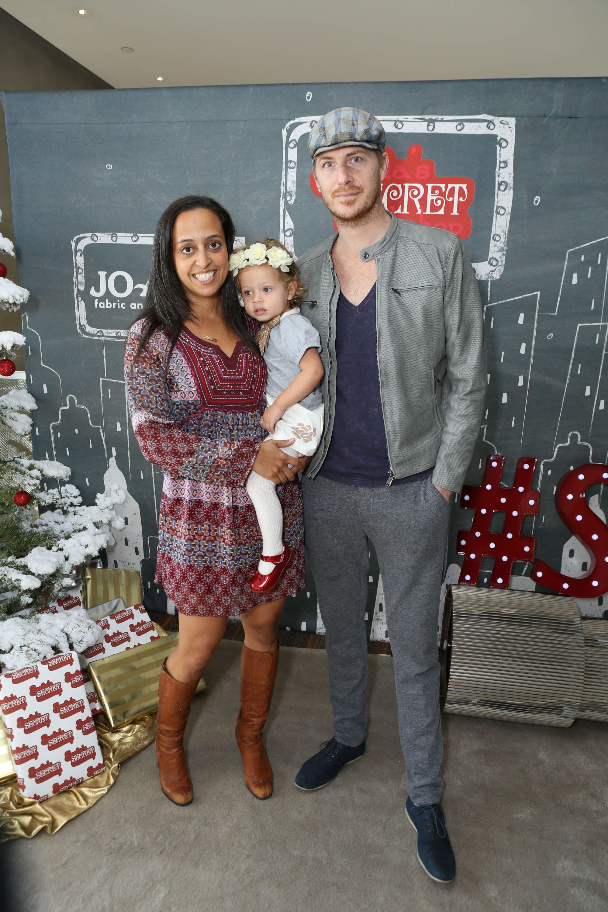 Chudney Ross, Joshua Faulkner, and their daughter Callaway at the 4th Annual Santa's Secret Workshop Benefiting LA Family Housing on December 6, 2014, in Los Angeles, California | Source: Getty Images