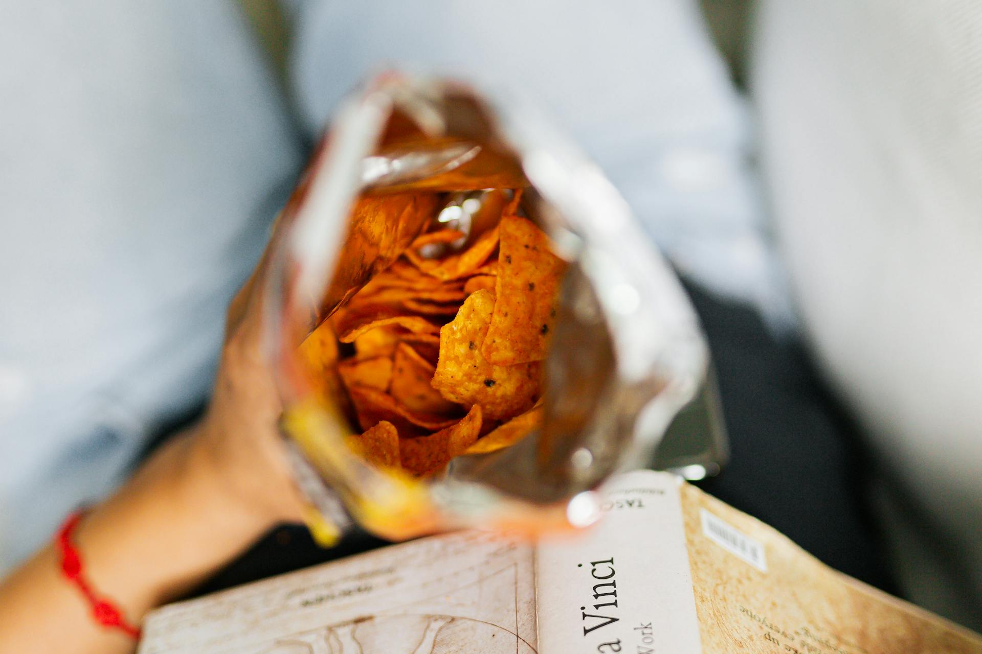 A person holding a bag of chips | Source: Pexels