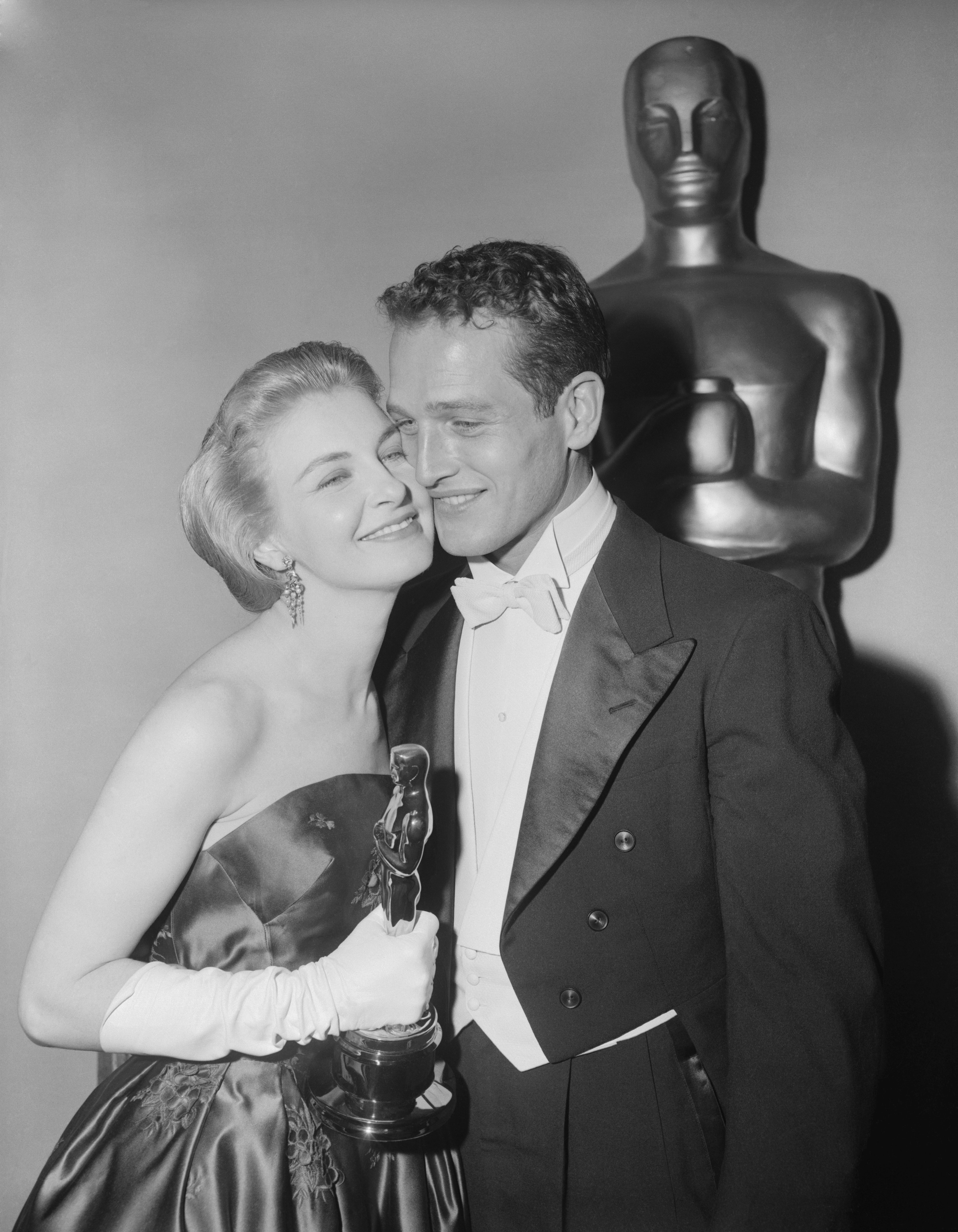 Paul Newman and Joanne Woodward at the 30th Annual Academy Awards after Woodward won her Oscar in 1958. | Source: Getty Images