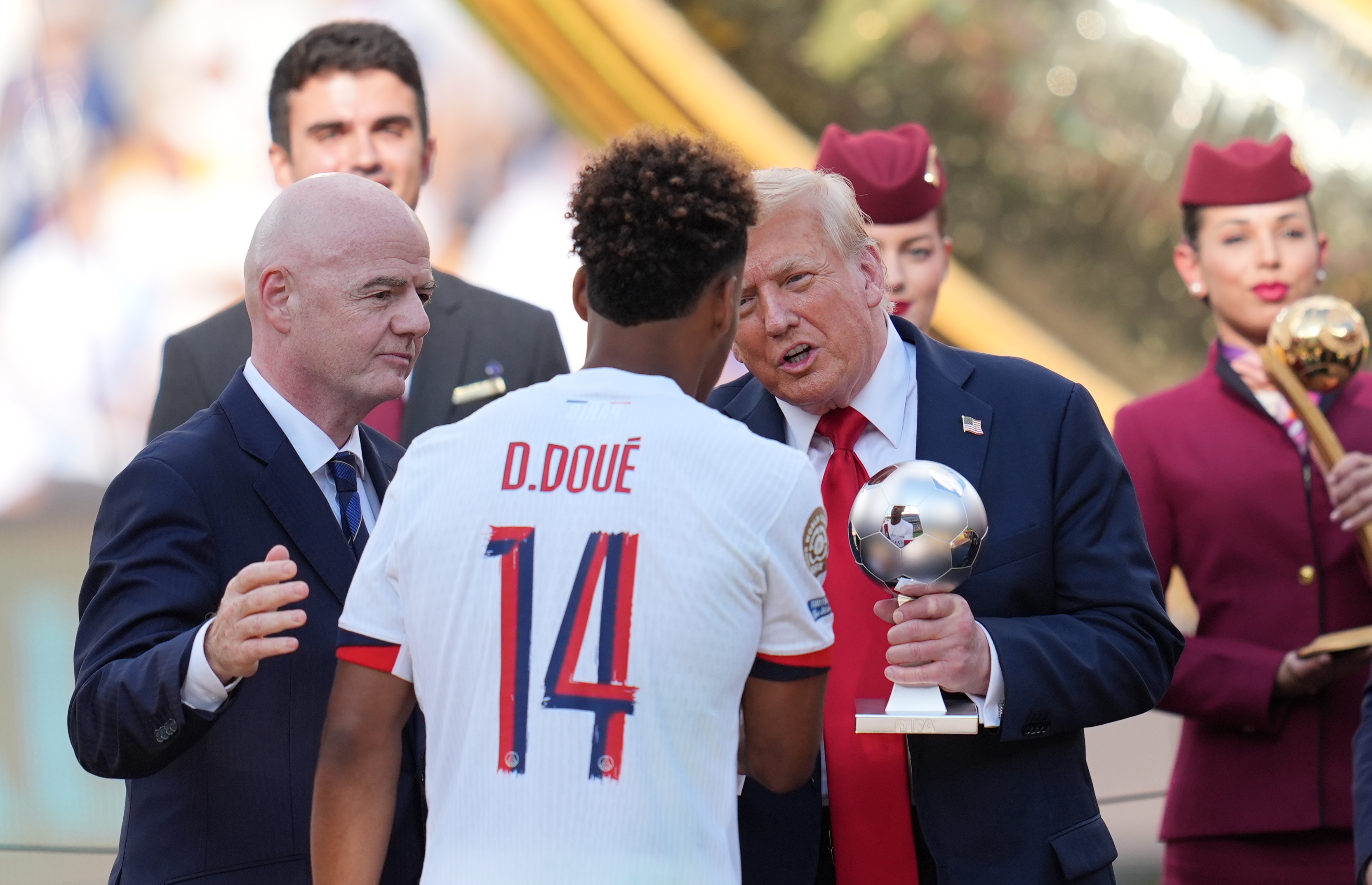 Donald Trump and Gianni Infantino presenting medals to the players following the FIFA Club World Cup 2025 final match on July 13 in New Jersey. | Source: Getty Images