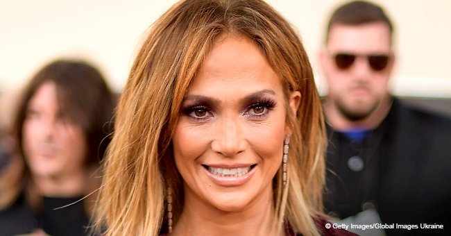 Jennifer Lopez gets dragged after stepping out in white shirt-dress and denim thigh-high boots