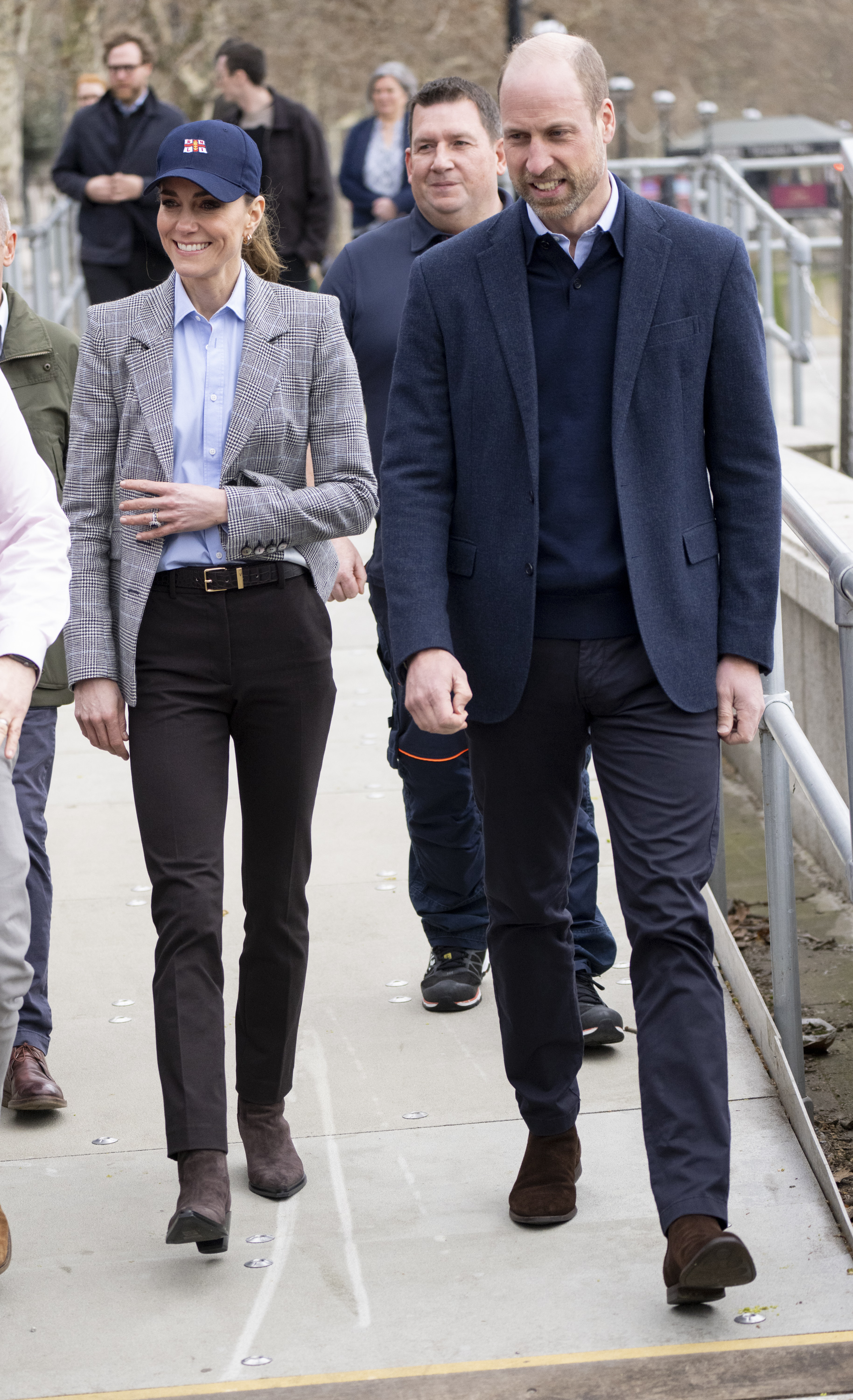 Catherine, Princess of Wales waves to well-wishers as she and Prince William, Prince of Wales walk along the riverside during their visit to the RNLI Tower Station on 12 March 2026 in London, England. | Source: Getty Images