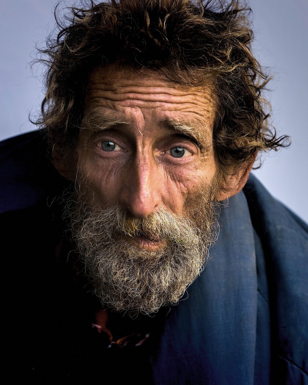 A rugged-looking man starring at the camera | Photo: Pixabay/Leroy Skalstad