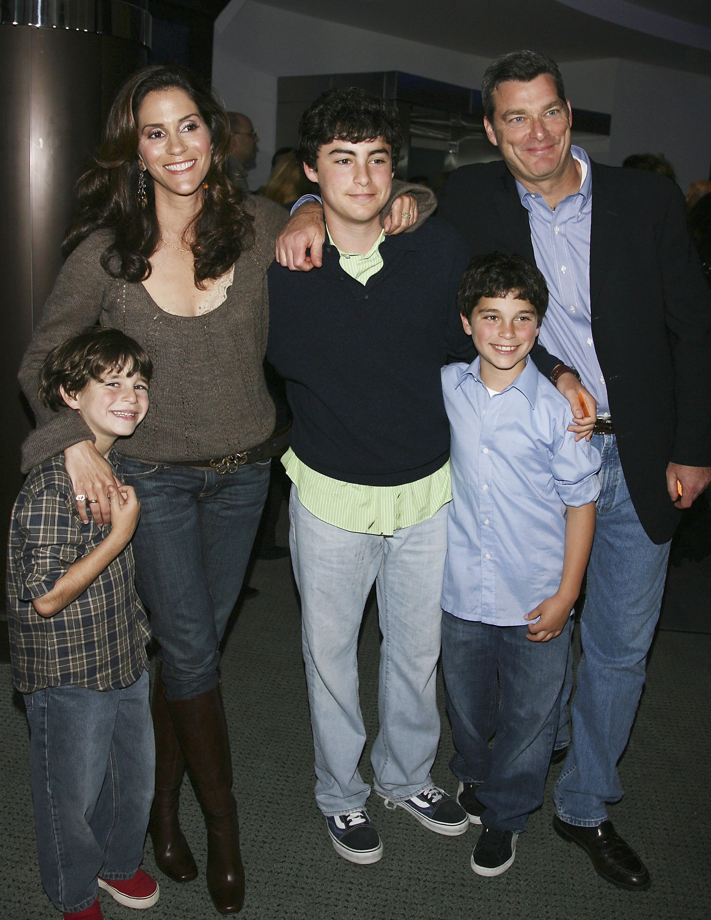 Jami Gertz, Tony Ressler with their children, Theo, Oliver, and Nick at the premiere of 