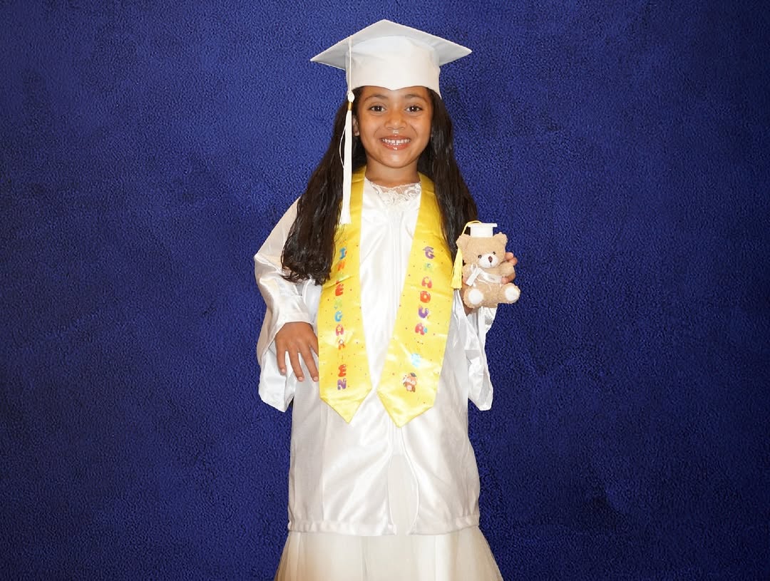Elleven Broadus pictured in a graduation attire, dated July 2024 | Source: Instagram/e11evenandskylove