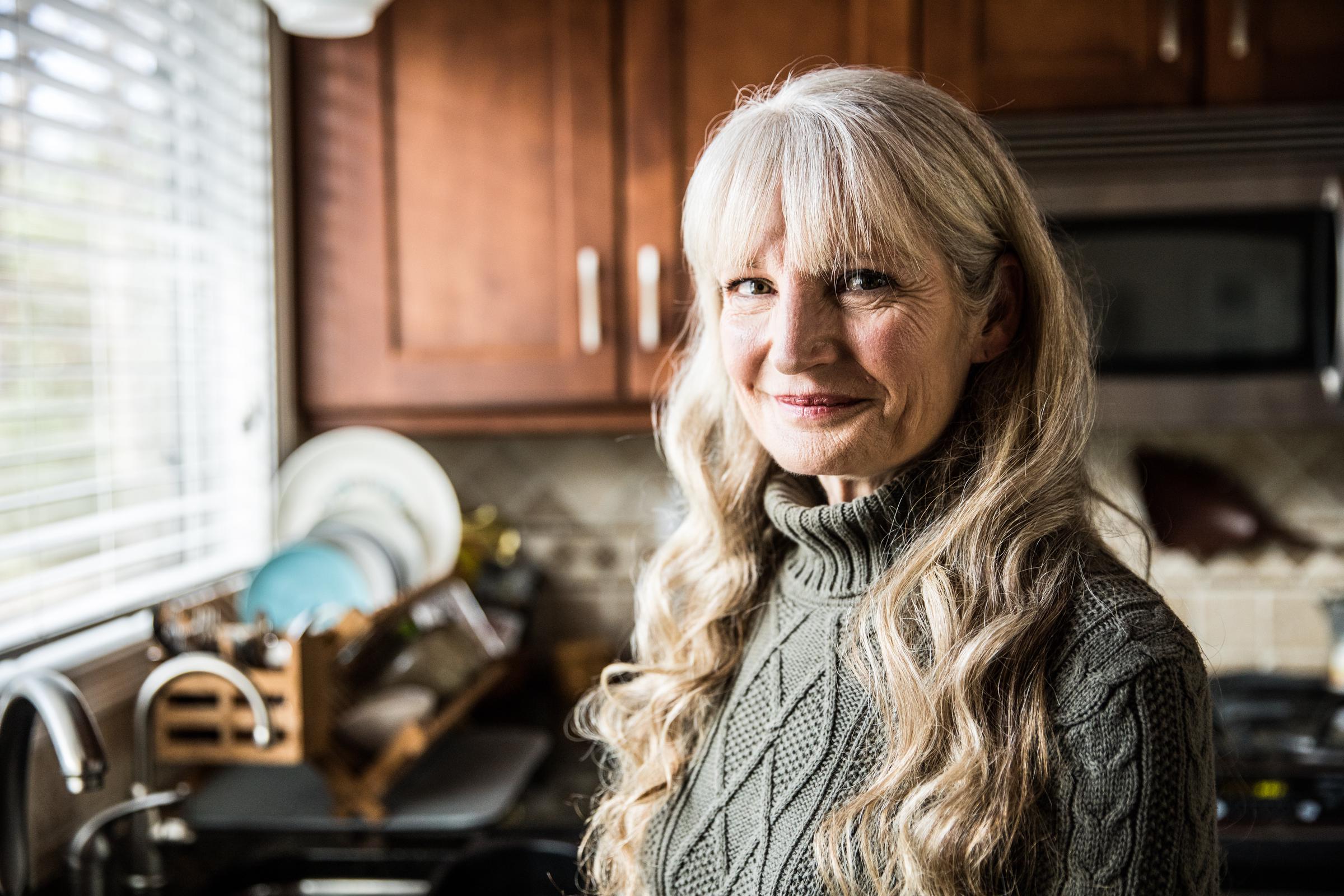 A woman in her kitchen | Source: Getty Images