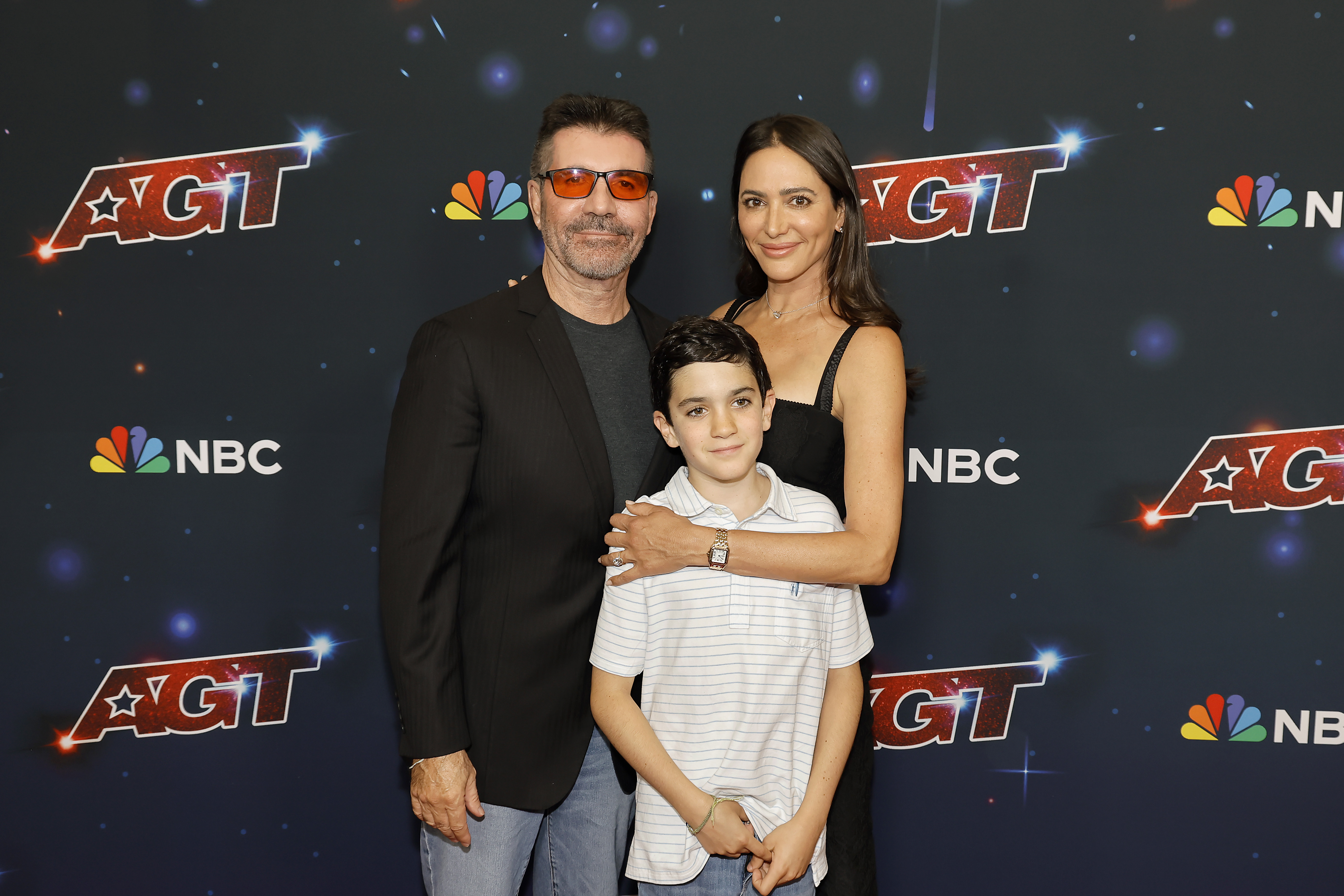 Simon Cowell, Eric Philip Cowell, and Lauren Silverman on the red carpet for "America's Got Talent" season 18 finale on September 27, 2023, in Pasadena, California | Source: Getty Images