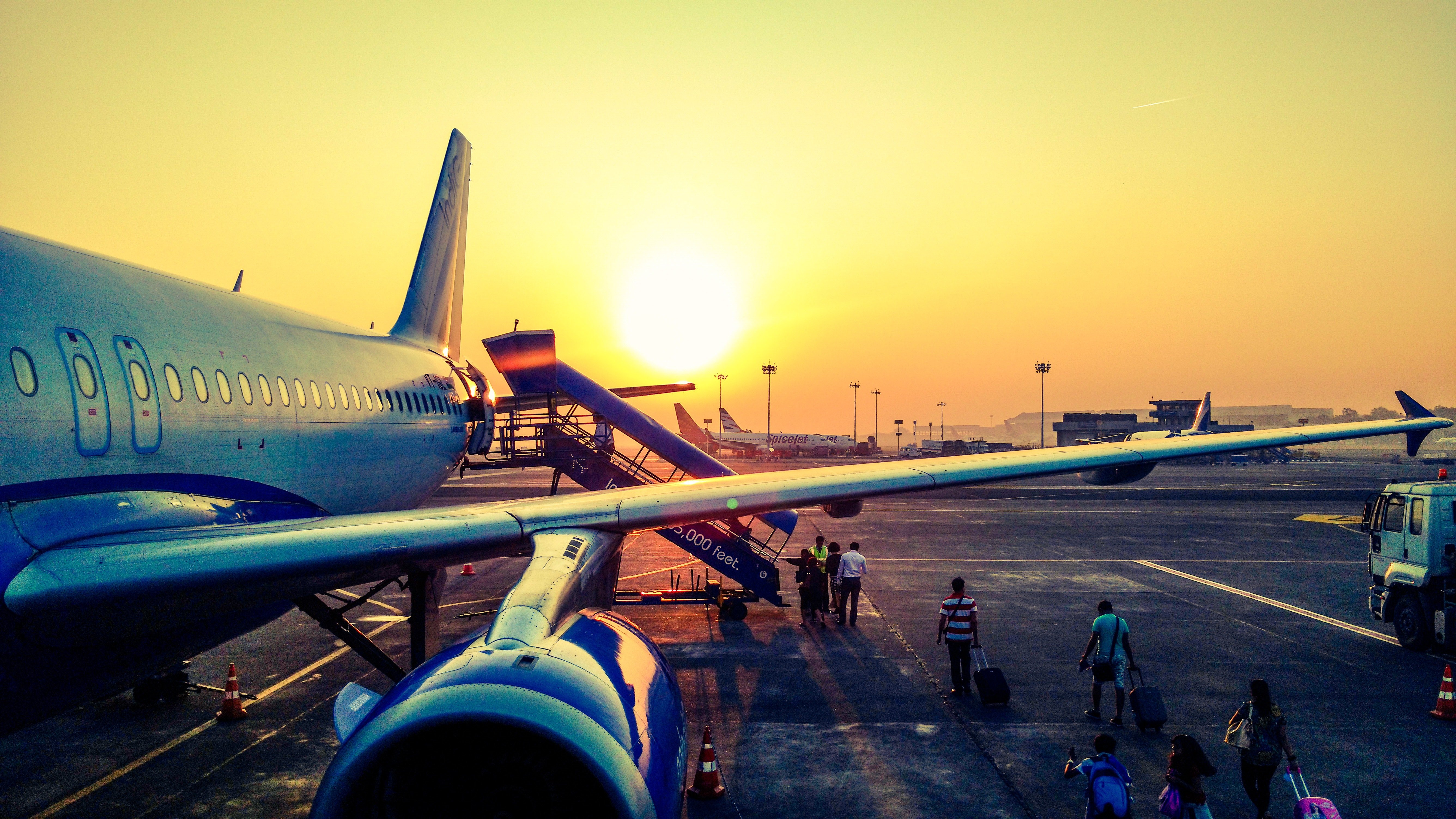 Pictured - Passengers boarding a plane | Source: Pexels 
