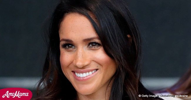 Meghan Markle shares radiant smile when greeted by two Bernese mountain dogs in Ireland