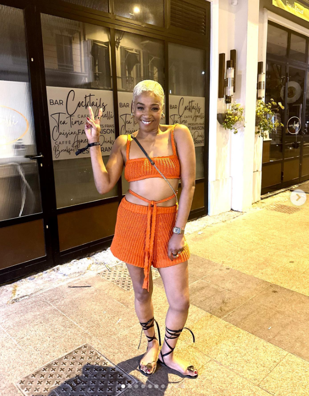 Tiffany Haddish in an orange crochet two-piece set and black lace-up sandals on June 29, 2023 | Source: Instagram/tiffanyhaddish