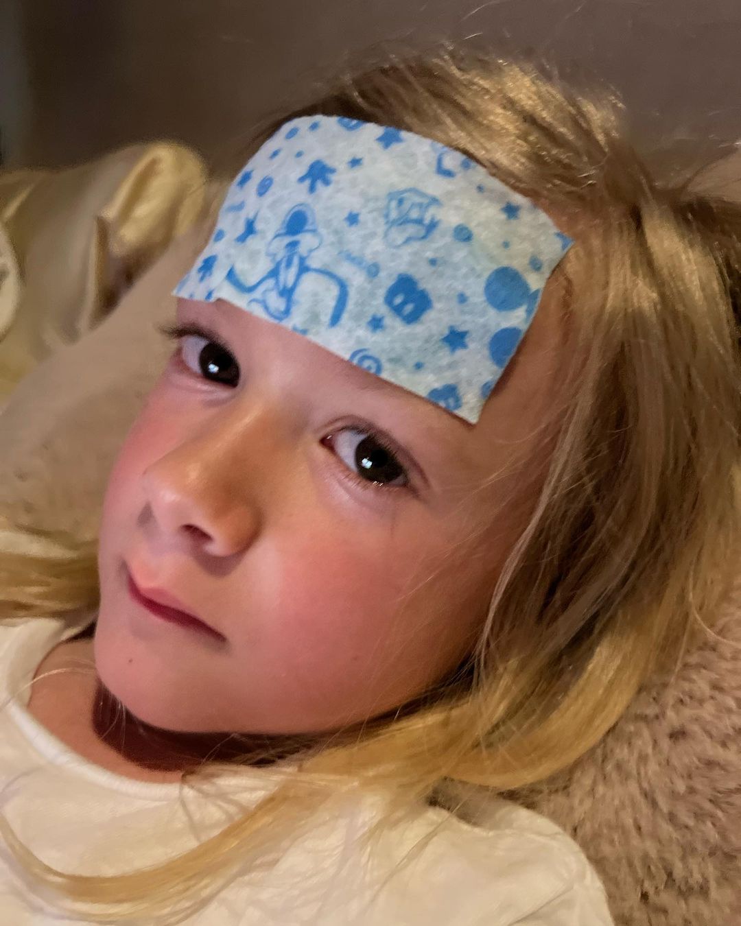 Tori Spelling's sick child after being exposed to mold, from an Instagram post dated May 11, 2023 | Source: Instagram/torispelling/