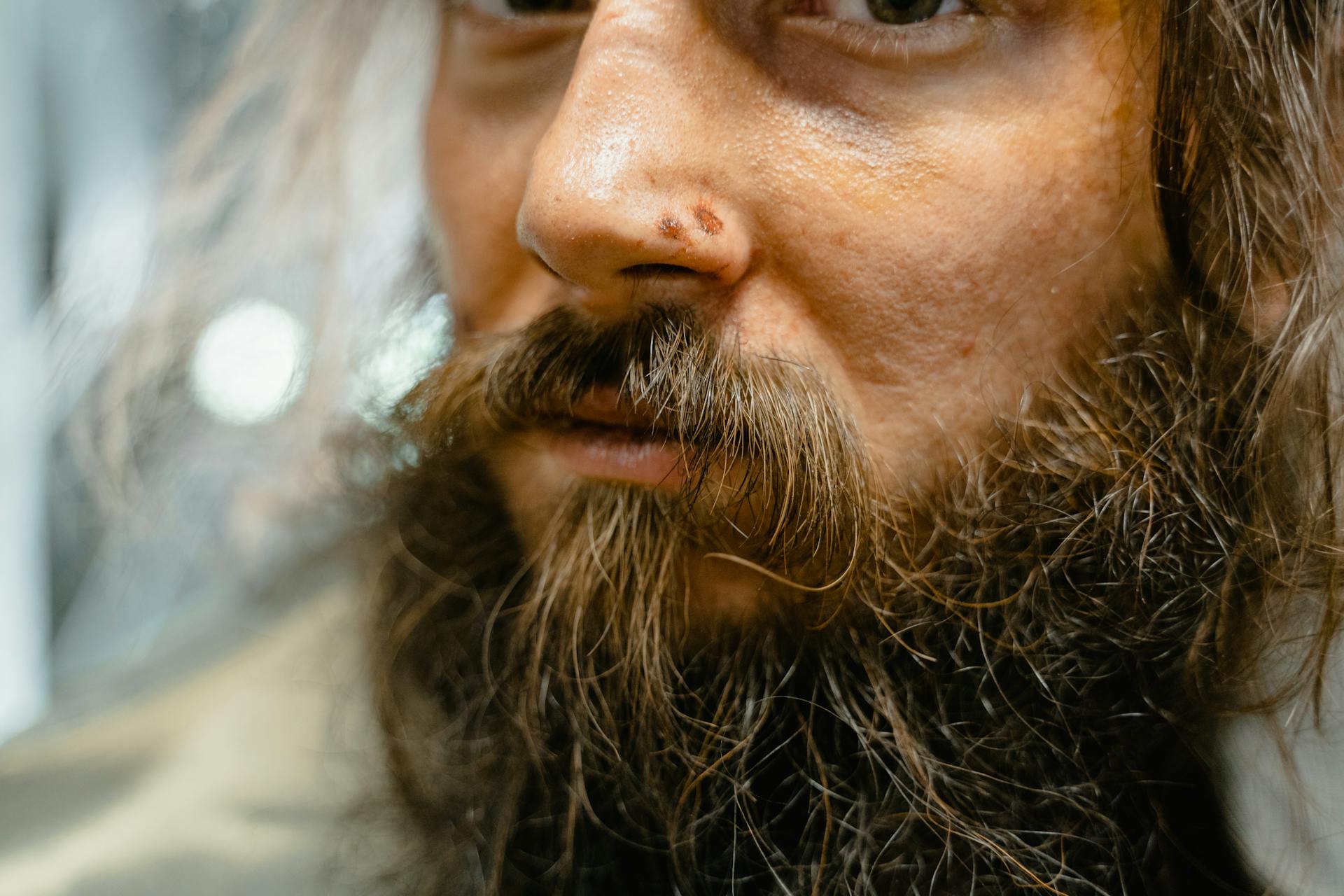 A close-up of a man with a beard | Source: Pexels
