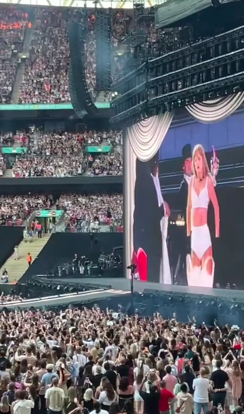 Taylor Swift getting undressed during her and Travis Kelce's skit, posted on June 24, 2024 | Source: TikTok/people