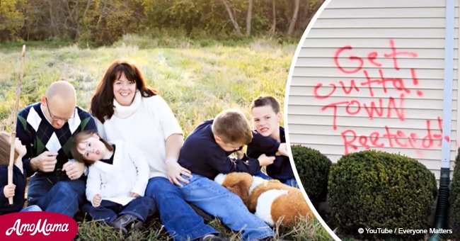 Family gets hateful graffiti on their house after adopting 2 little girls