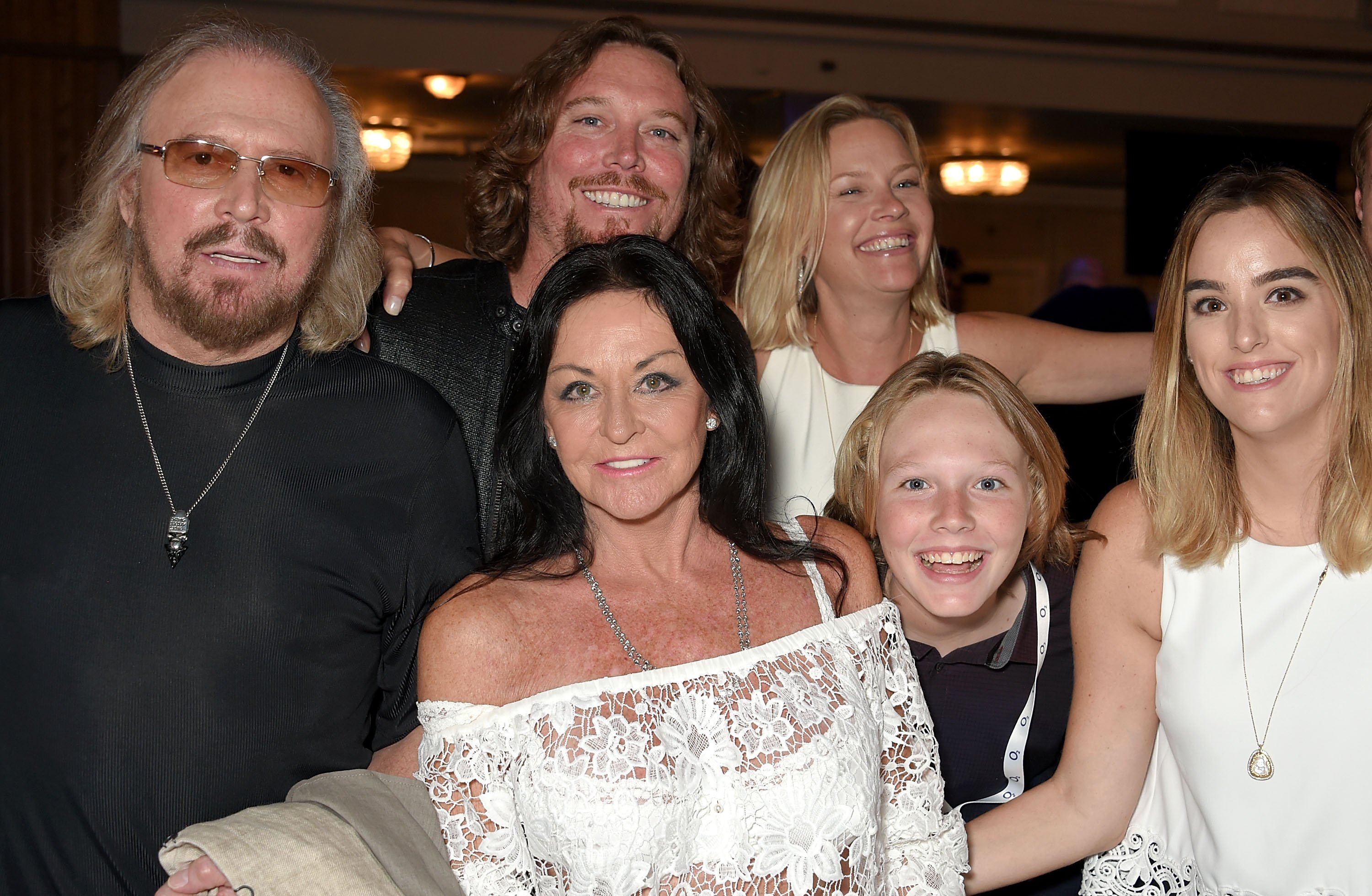 Barry Gibb, Ashley Gibb, Linda Gibb, Therese Gibb, Lucas Gibb, and Alexandra Gibb attend the Nordoff Robbins O2 Silver Clef Awards at The Grosvenor House Hotel on June 30, 2017 in London, England. | Source: Getty Images