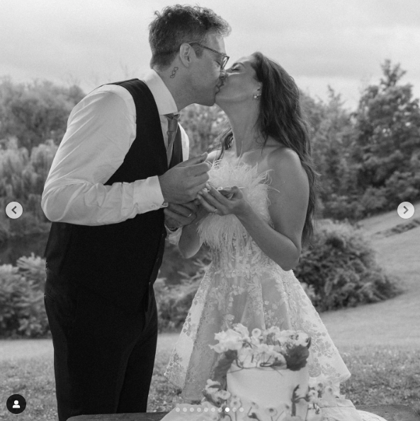 Ian Hock and Eva Amurri sharing a kiss on their wedding day, posted on July 2, 2024 | Source: Instagram/thehappilyeva