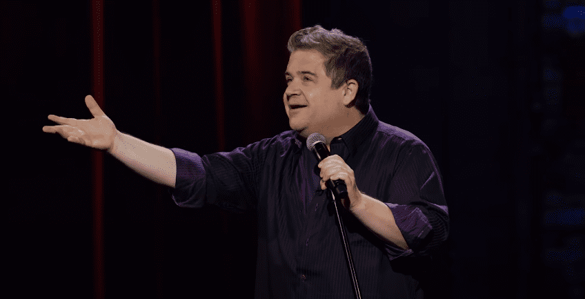Photo of Patton Oswalt during a comedy perfomance | Photo: Youtube / Netflix Is A Joke