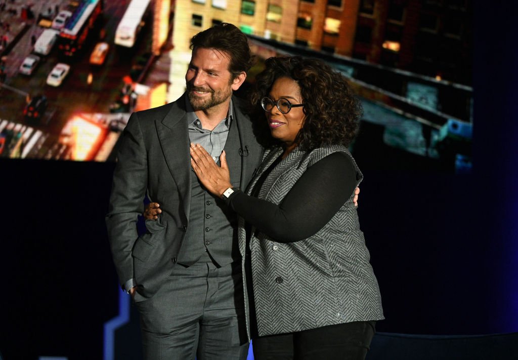 Bradley Cooper and Oprah Winfrey speak onstage during Oprah's SuperSoul Conversations at PlayStation Theater | Photo: Getty Images