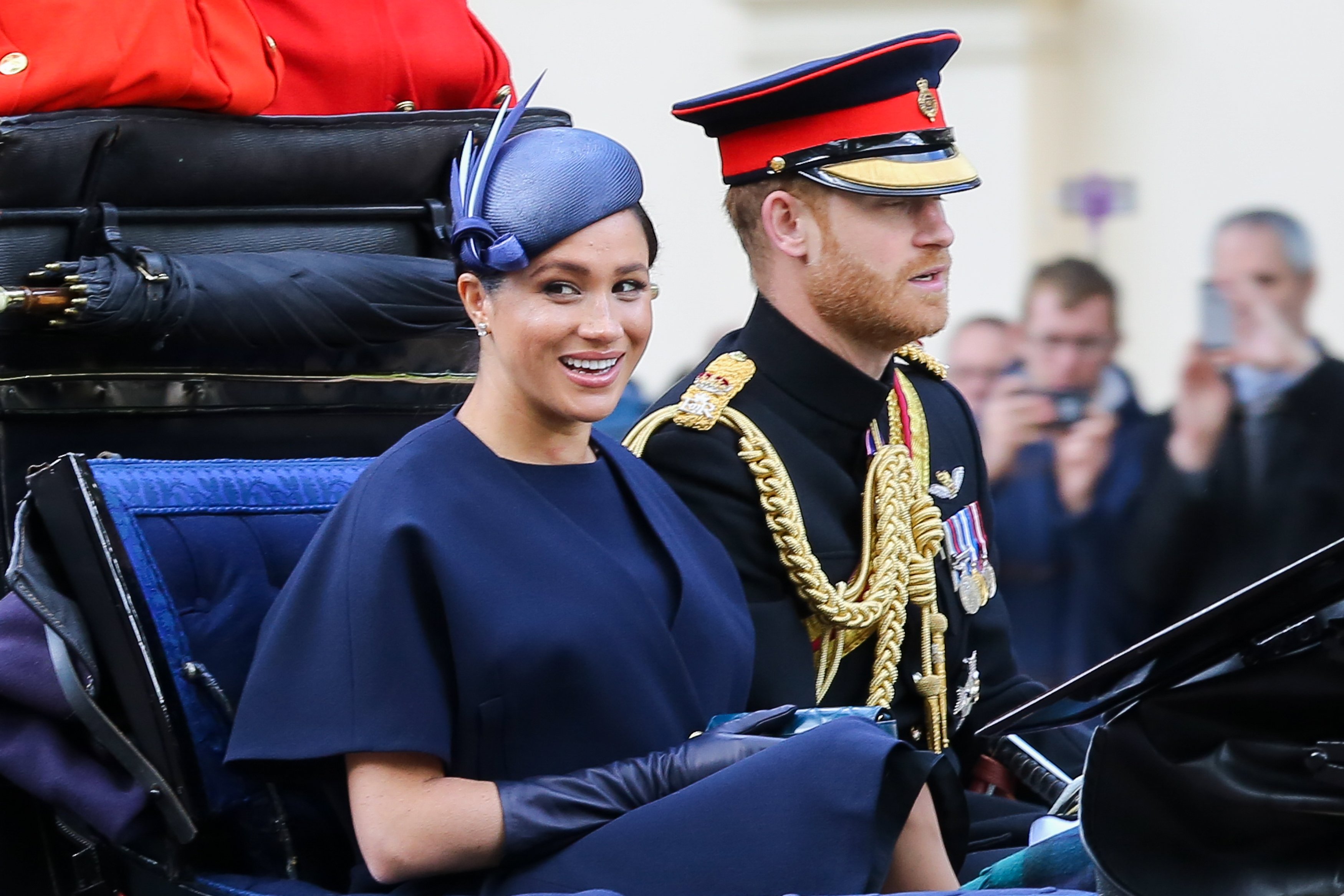 Meghan Duchess of Sussex and Prince Harry are seen in a carriage on their way to Buckingham Palace after attending the Trooping the Color ceremony, which marks the 93rd birthday of, Queen Elizabeth II, Britain's longest reigning monarch. | Source: Getty Images