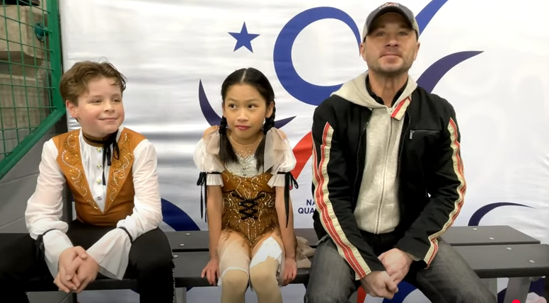 Skaters Sean Kay, Angela Yang and their coach Alexandr "Sasha" Kirsanov from a video posted on November 20, 2024 | Source: YouTube/@USFigureSkating