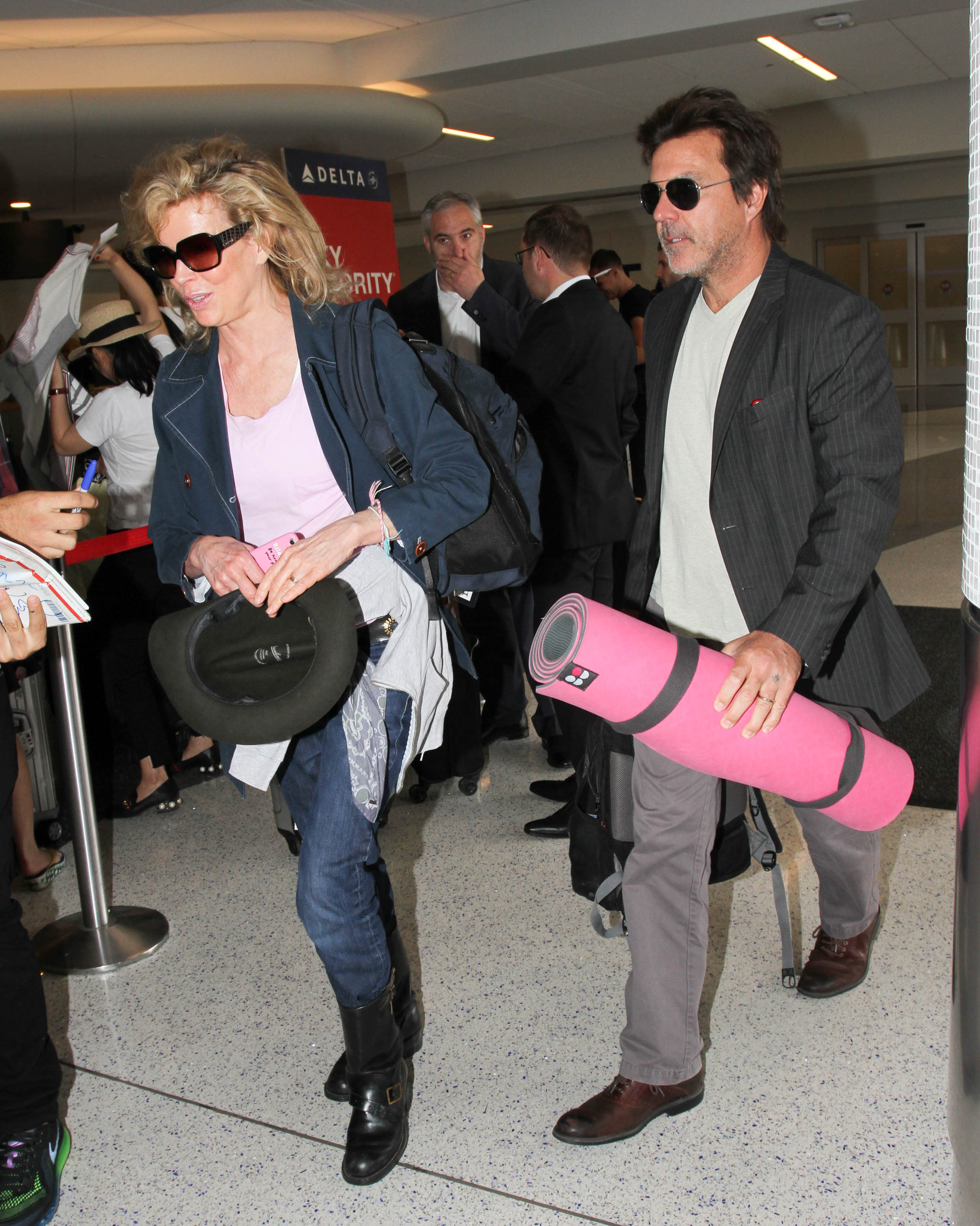 Kim Basinger and Mitch Stone sighted at LAX International Airport in Los Angeles, 2016 | Source: Getty Images