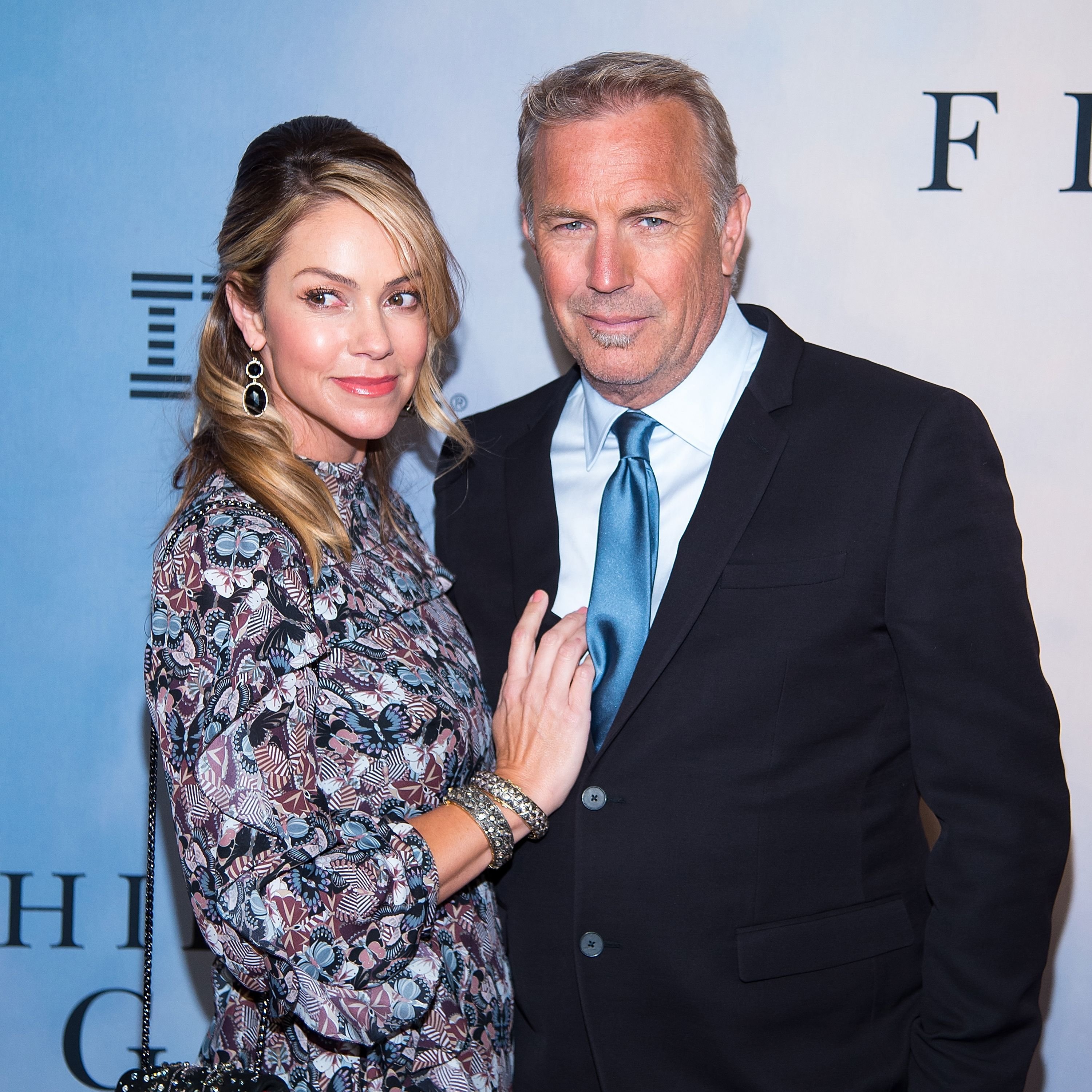 Christine Baumgartner and Kevin Costner during the "Hidden Figures" New York special screening on December 10, 2016 in New York City. | Source: Getty Images