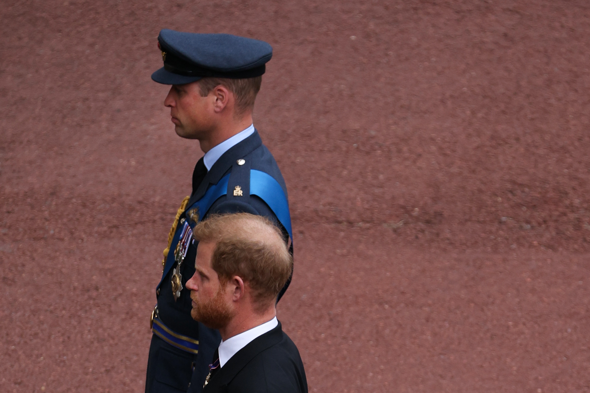 Prince William and Prince Harry walk behind the coffin as the Procession of the coffin of Queen Elizabeth II travels to Windsor Castle in Windsor, England on  September 19, 2022 | Source: Getty Images