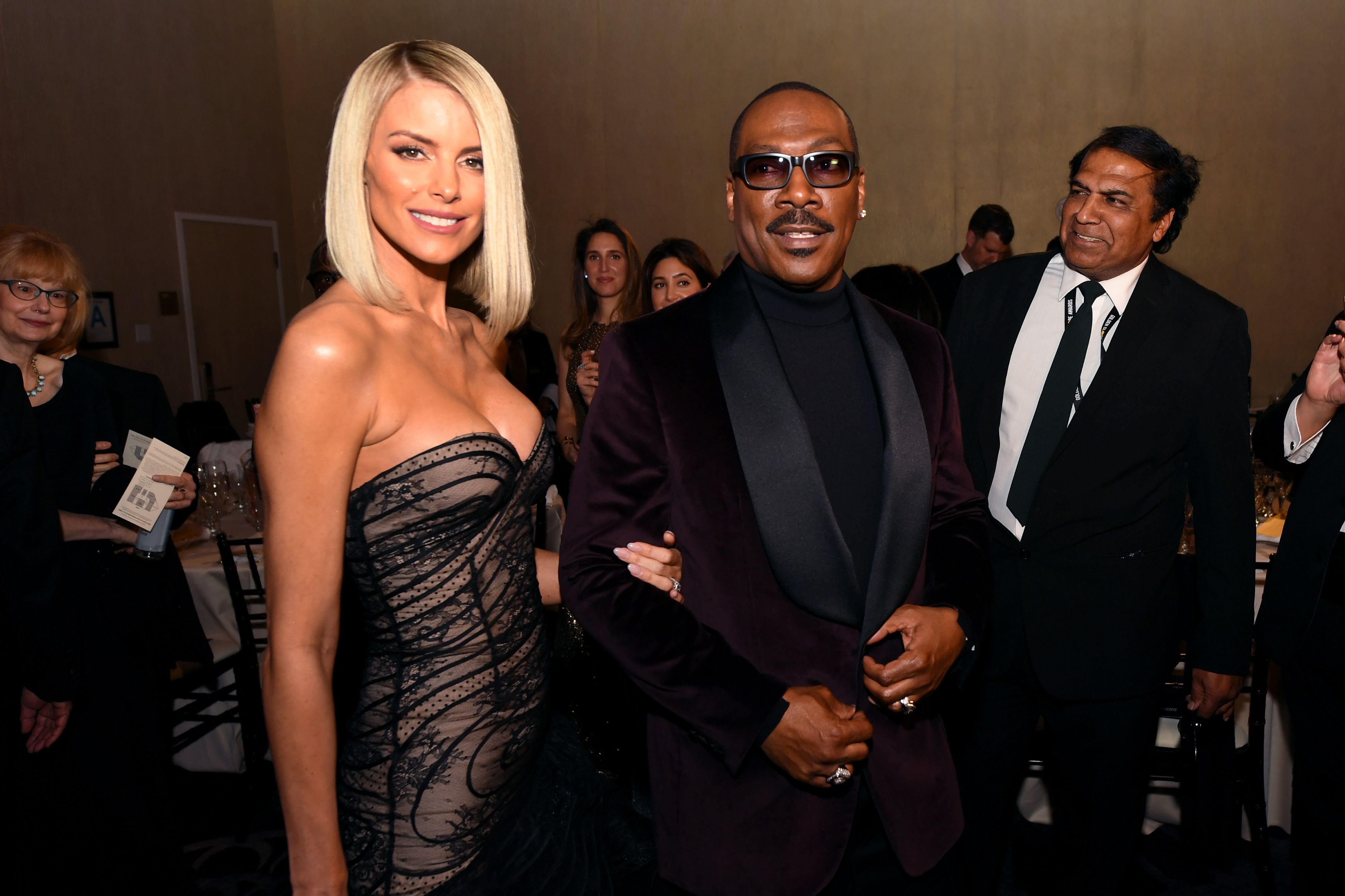 Paige Butcher and Eddie Murphy at the 77th Annual Golden Globe Awards Cocktail Reception on January 05, 2020 in Beverly Hills | Source: Getty Images