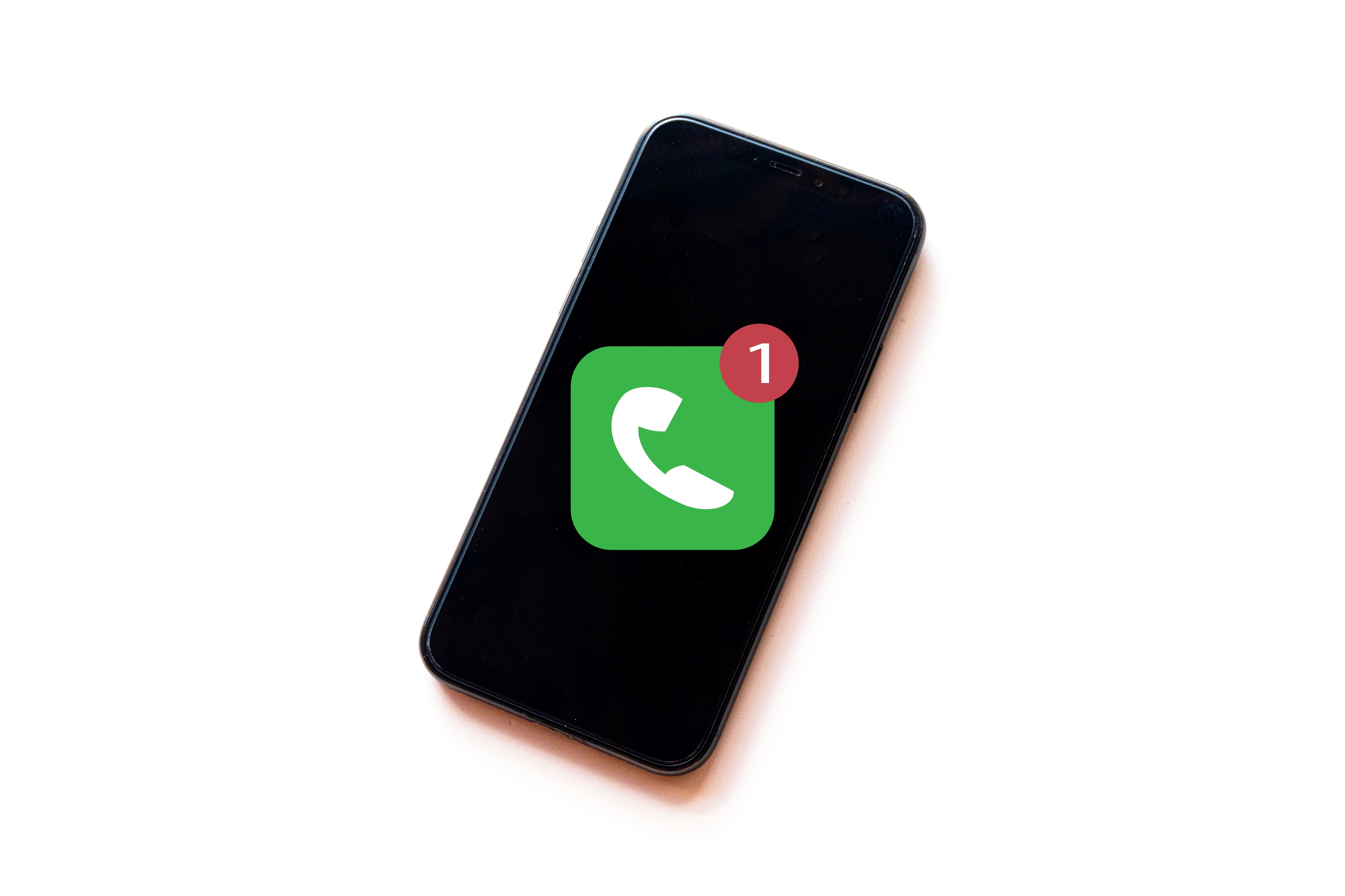 A smart phone showing a missed call | Source: Shutterstock