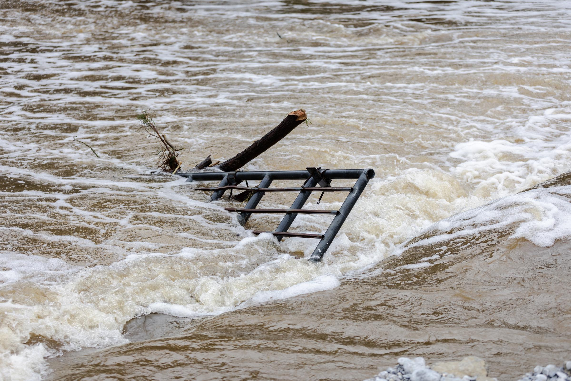 Debris sits in the Guadalupe River after flash flooding damaged nearby buildings on July 5, 2025 in Center Point, Texas. | Source: Getty Images