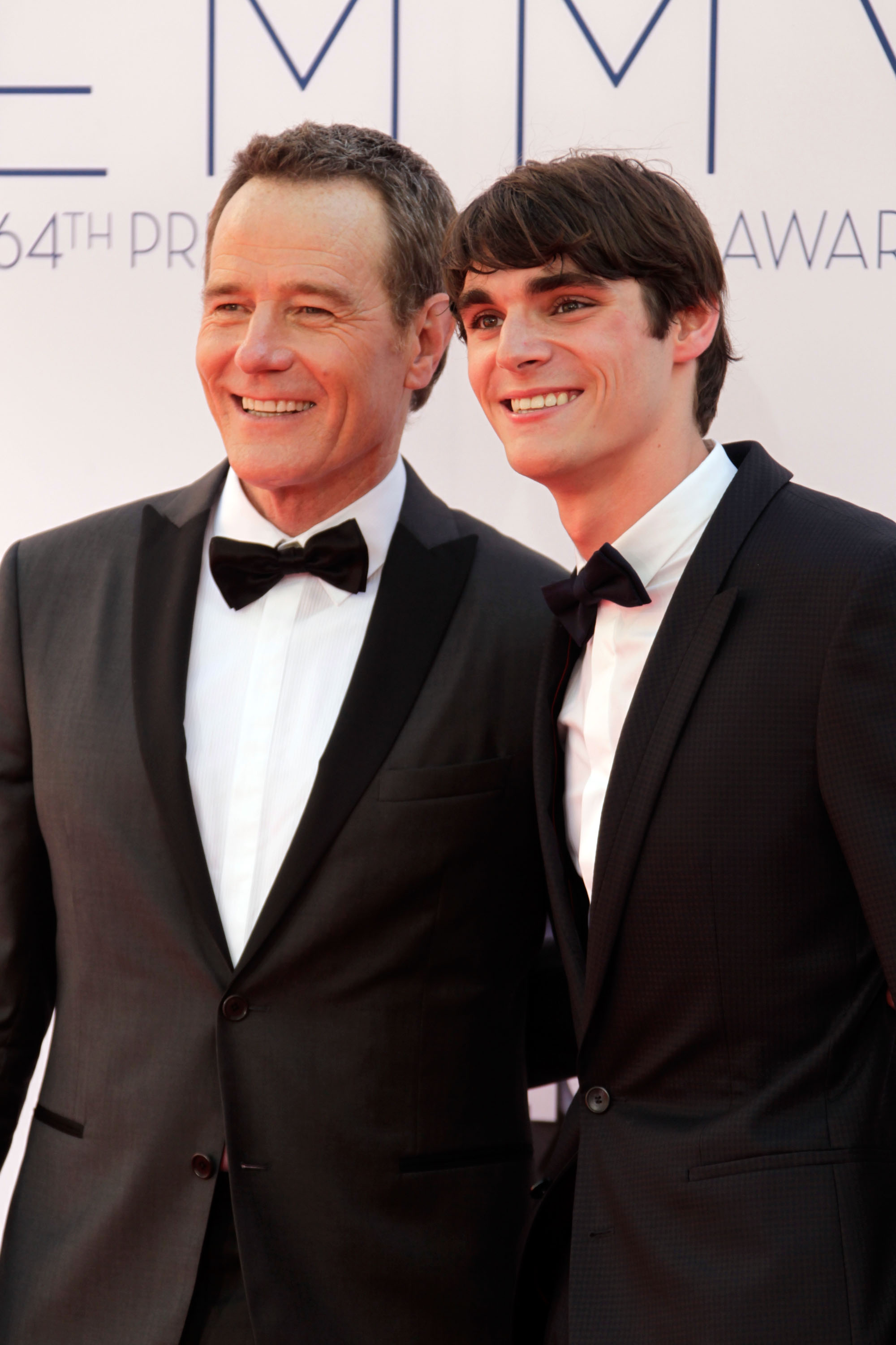 Bryan Cranston (L) and RJ Mitte arrive at the 64th Primetime Emmy Awards at Nokia Theatre L.A. Live on September 23, 2012 in Los Angeles, California. | Source: Getty Images