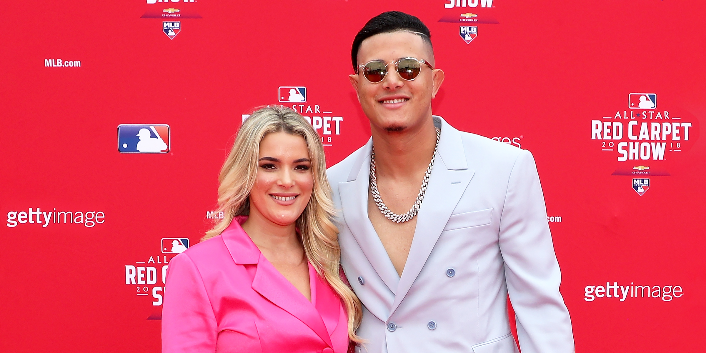 Yainee Alonso and Manny Machado | Source: Getty Images