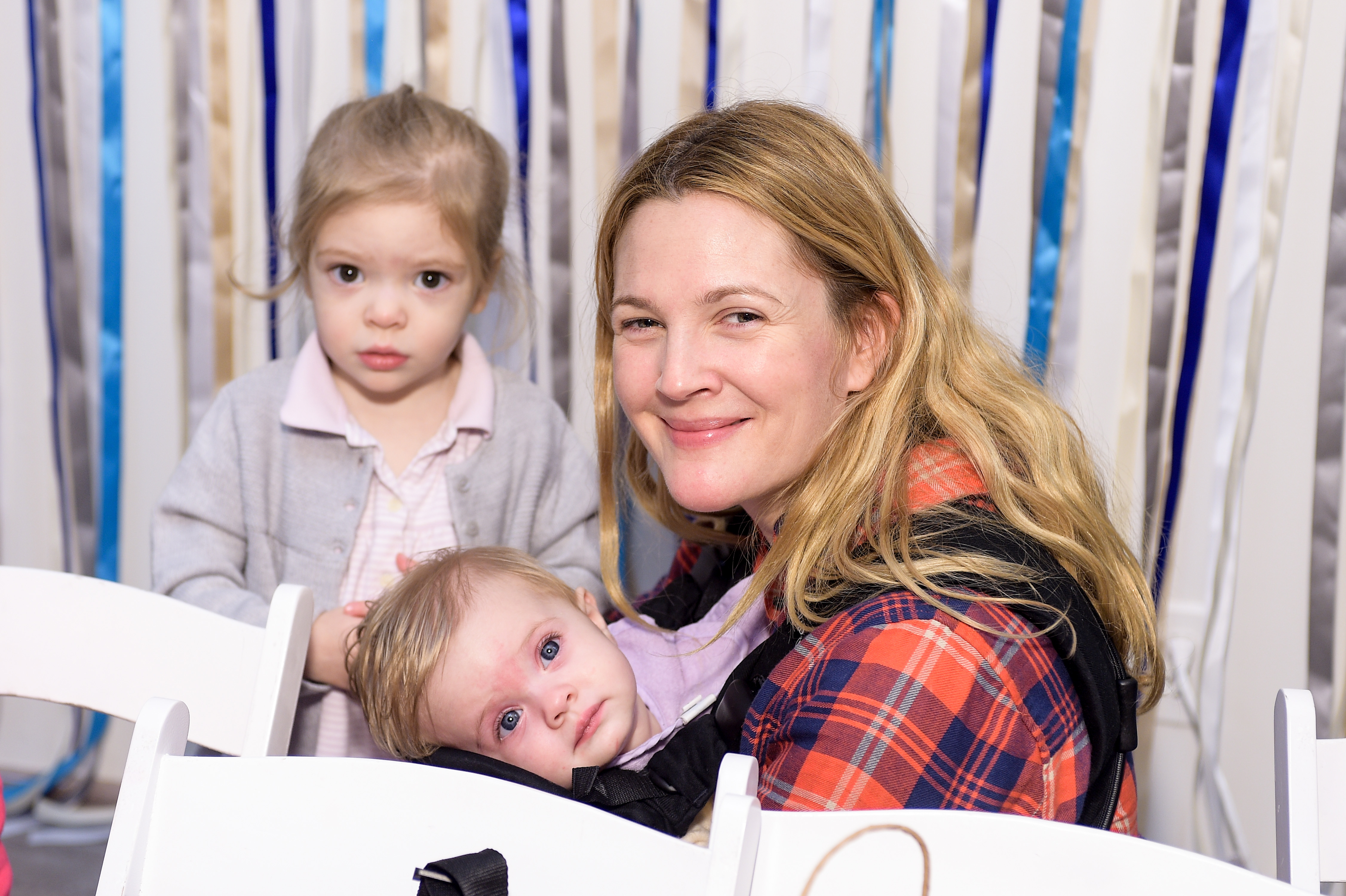 Drew Barrymore, Olive Barrymore Kopelman, and Frankie Barrymore Kopelman attend Baby2Baby Holiday Party Presented By The Honest Company in Los Angeles, California, on December 13, 2014. | Source: Getty Images