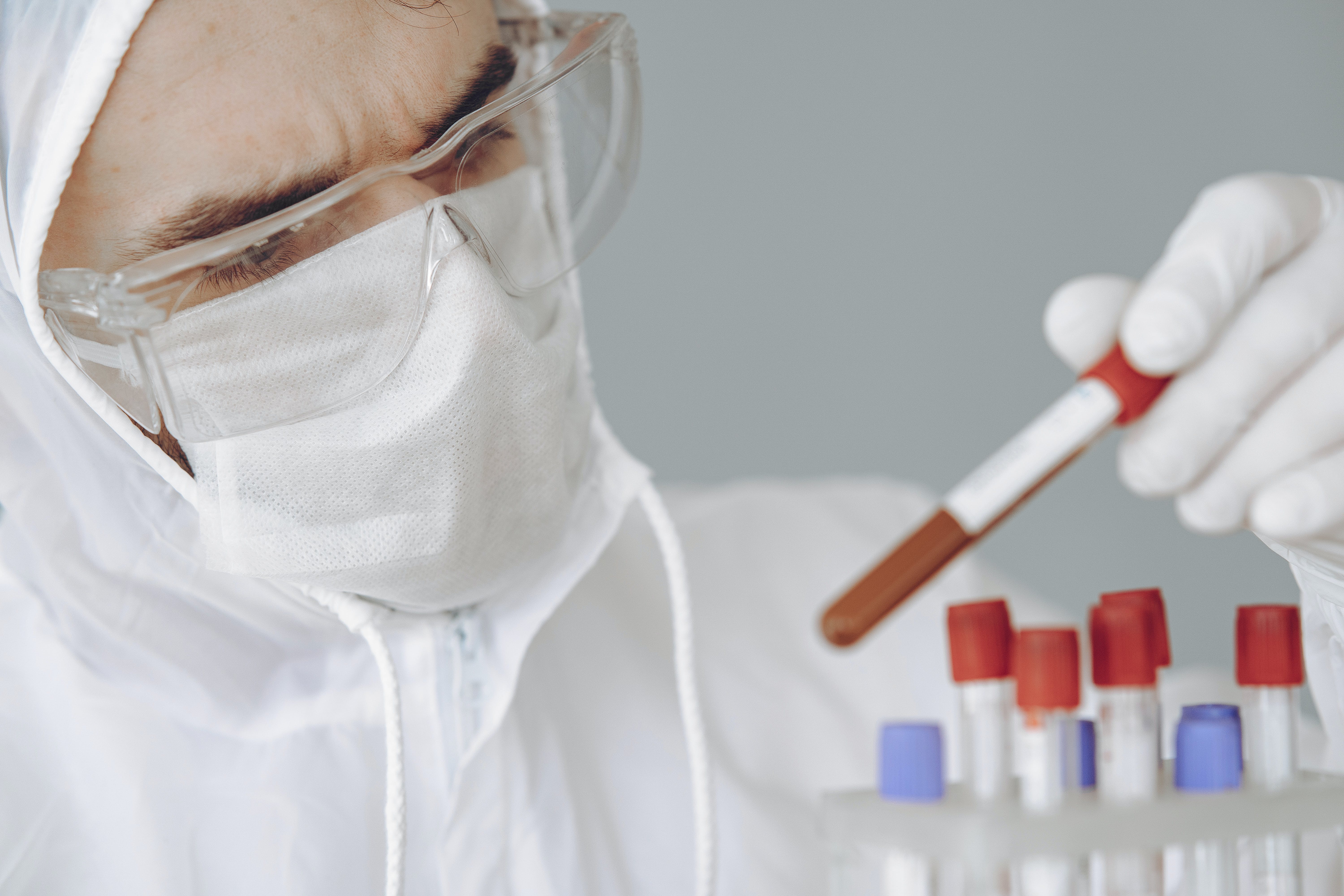 A person in a lab testing blood samples. | Source: Pexels