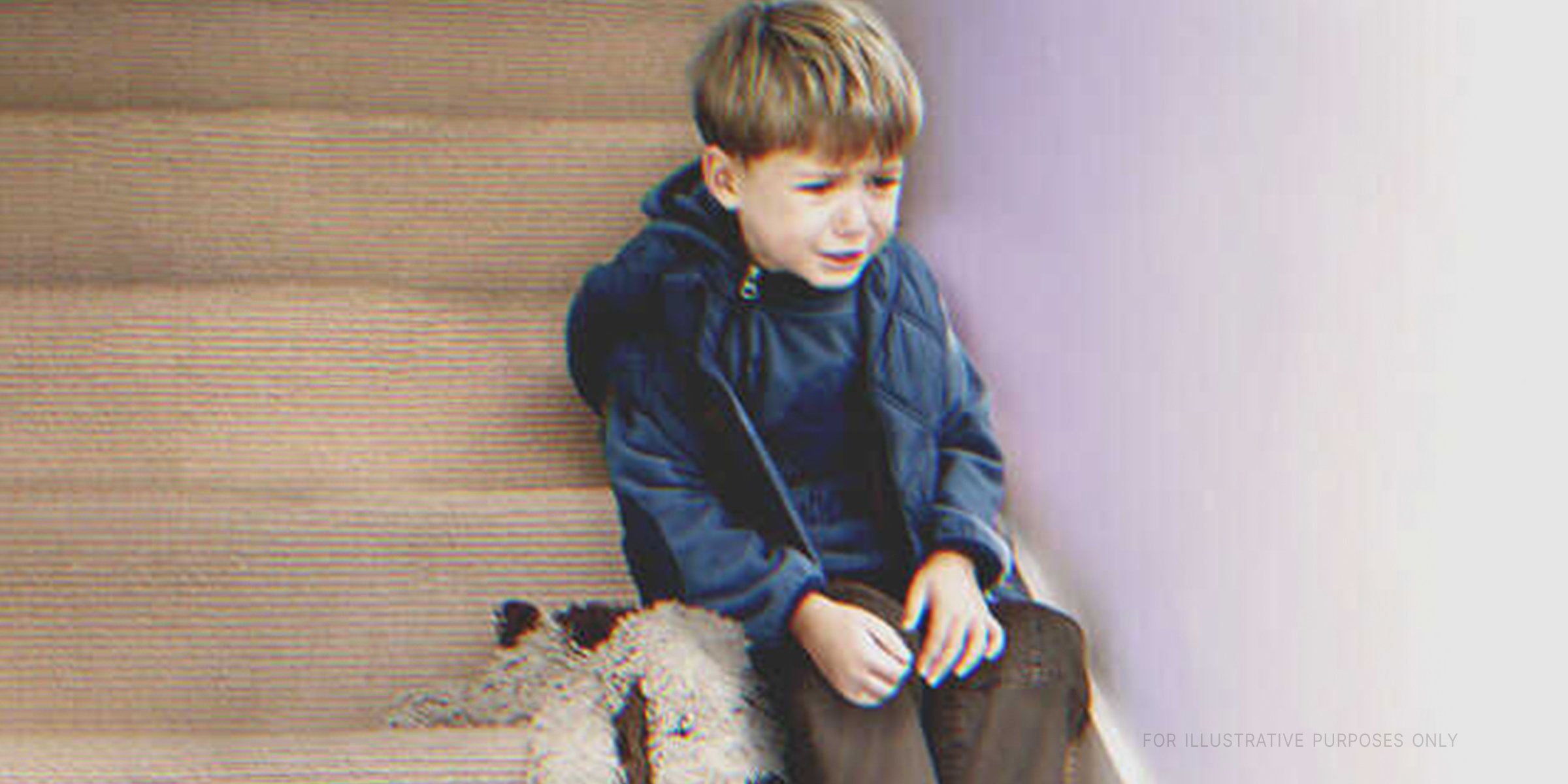 Little Boy Crying On The Stairs | Source: Shutterstock