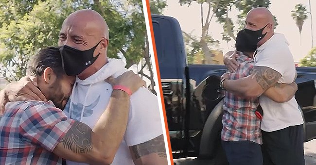 Dwayne "The Rock" Johnson hugging Oscar Rodriguez whom he just gifted his personal customized truck on November 24, 2021 | Photo: Instagram/therock