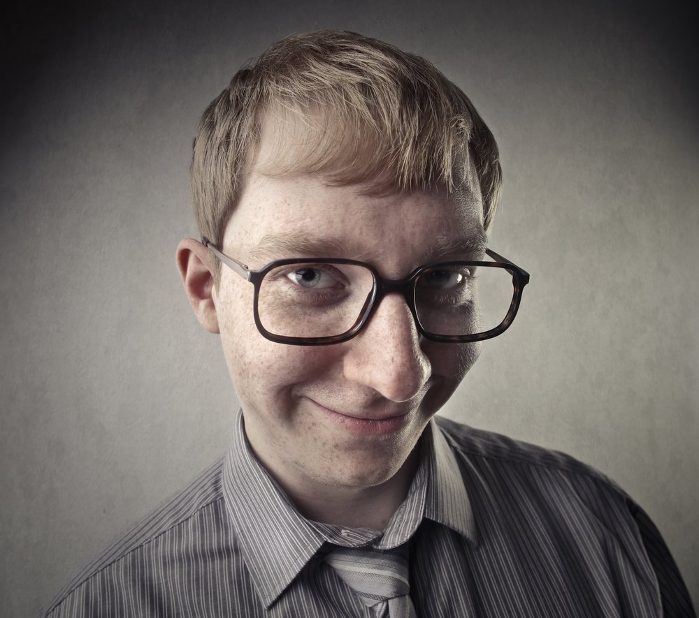 A man with glasses smiling | Photo: Shutterstock