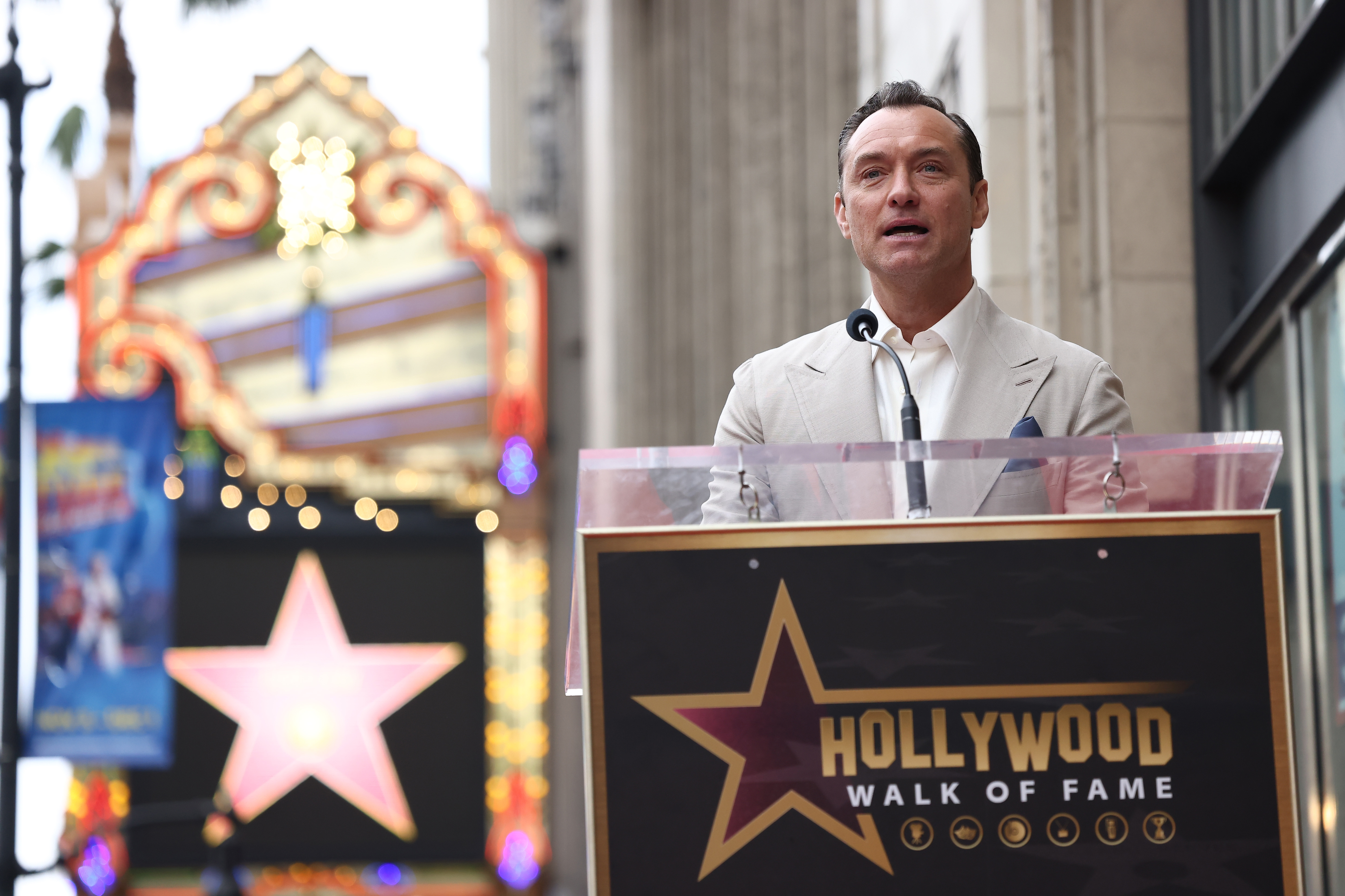 Jude Law attends his Hollywood Walk of Fame Star Ceremony on December 12, 2024, in Hollywood, California | Source: Getty Images