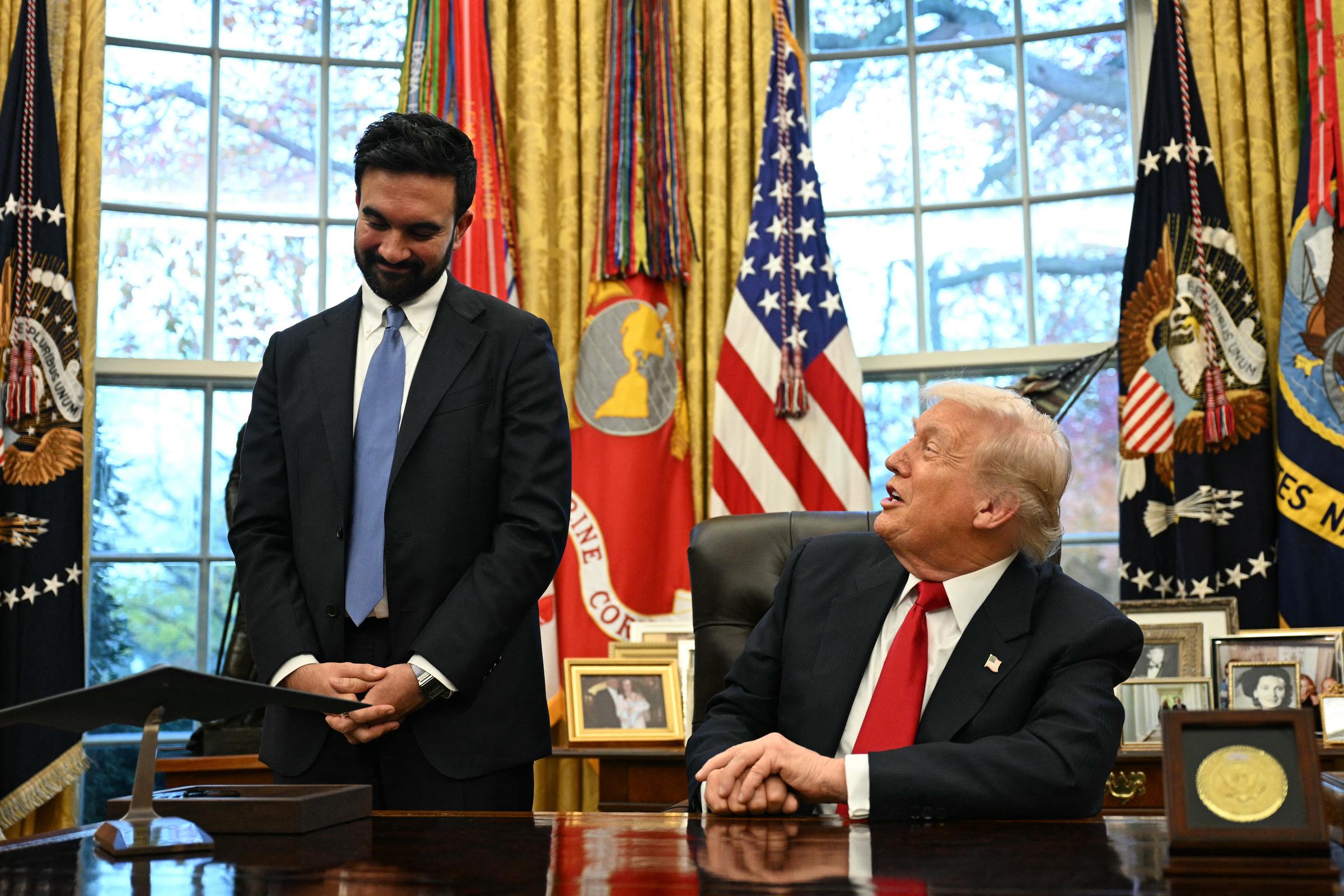 President Donald Trump looks at New York Mayor-elect Zohran Mamdani during their meeting in the Oval Office of the White House in Washington, D.C., on November 21, 2025. | Source: Getty Images