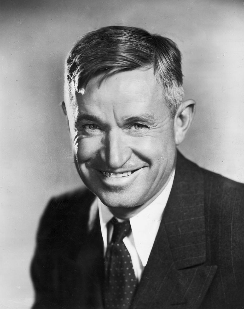 Studio portrait of American humorist and actor Will Rogers (1879 - 1935) smiling in a jacket and tie | Photo: Getty Images