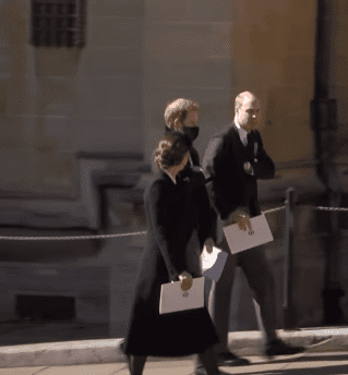 Kate Middleton, Prince Harry, and Prince William pictured walking together after Prince Philip's funeral, 2021, London, England. | Photo: Youtube.com/The Royal Family Channel