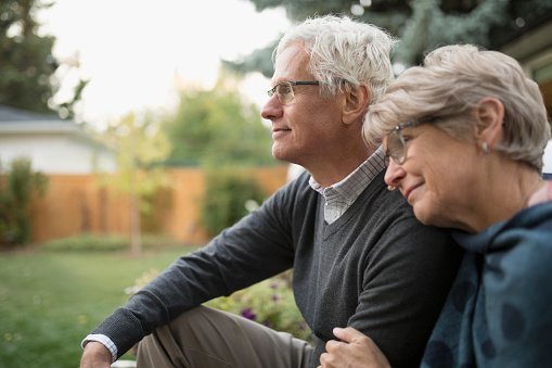 An old couple smiling.| Photo: Getty Images