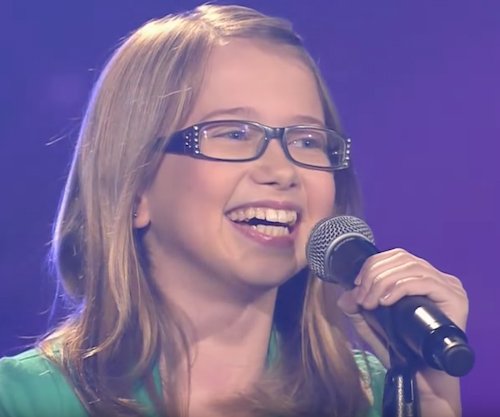 Laura during her performance| Screenshot: Youtube