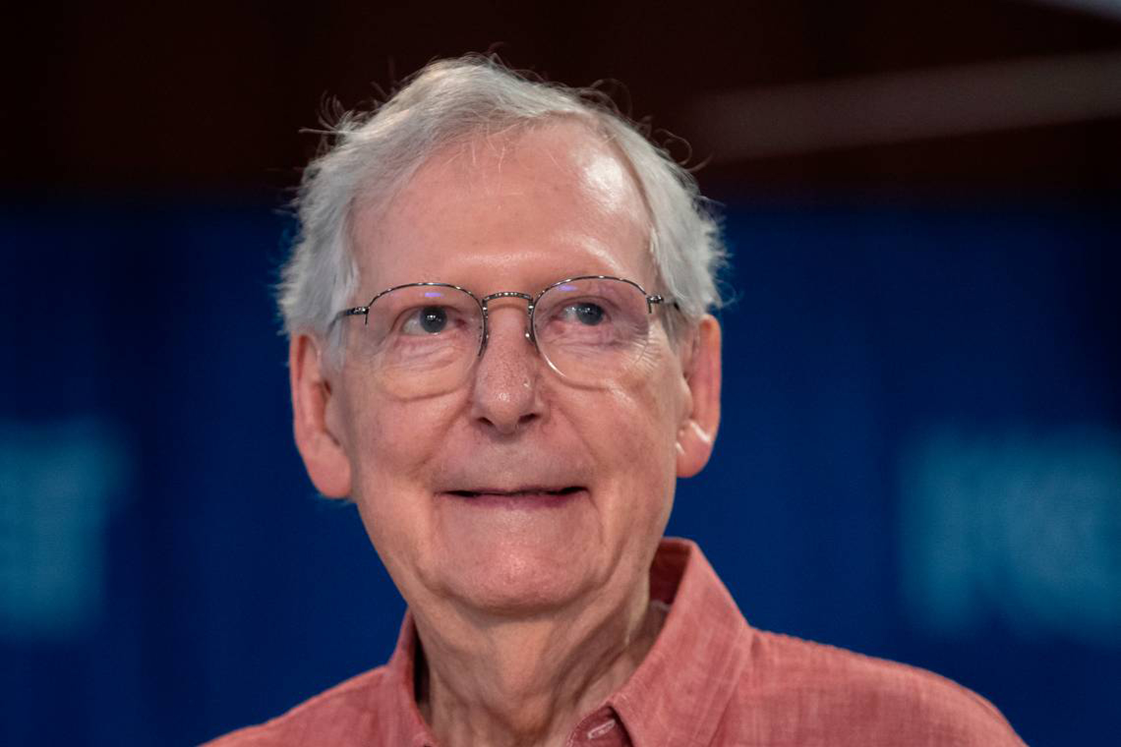 McConnell is pictured during the annual St. Jerome Fancy Farm Picnic in Kentucky in 2023. His recent recovery update drew mixed reactions online, with some Facebook users questioning the hospital photo he shared. | Source: Getty Images