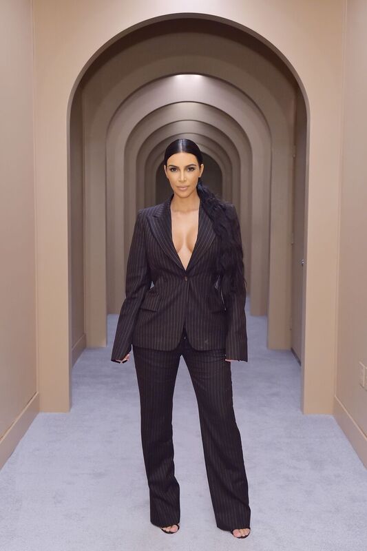 Kim Kardashian posing for a photo in her business attire | Source: Getty Images/GlobalImagesUkraine