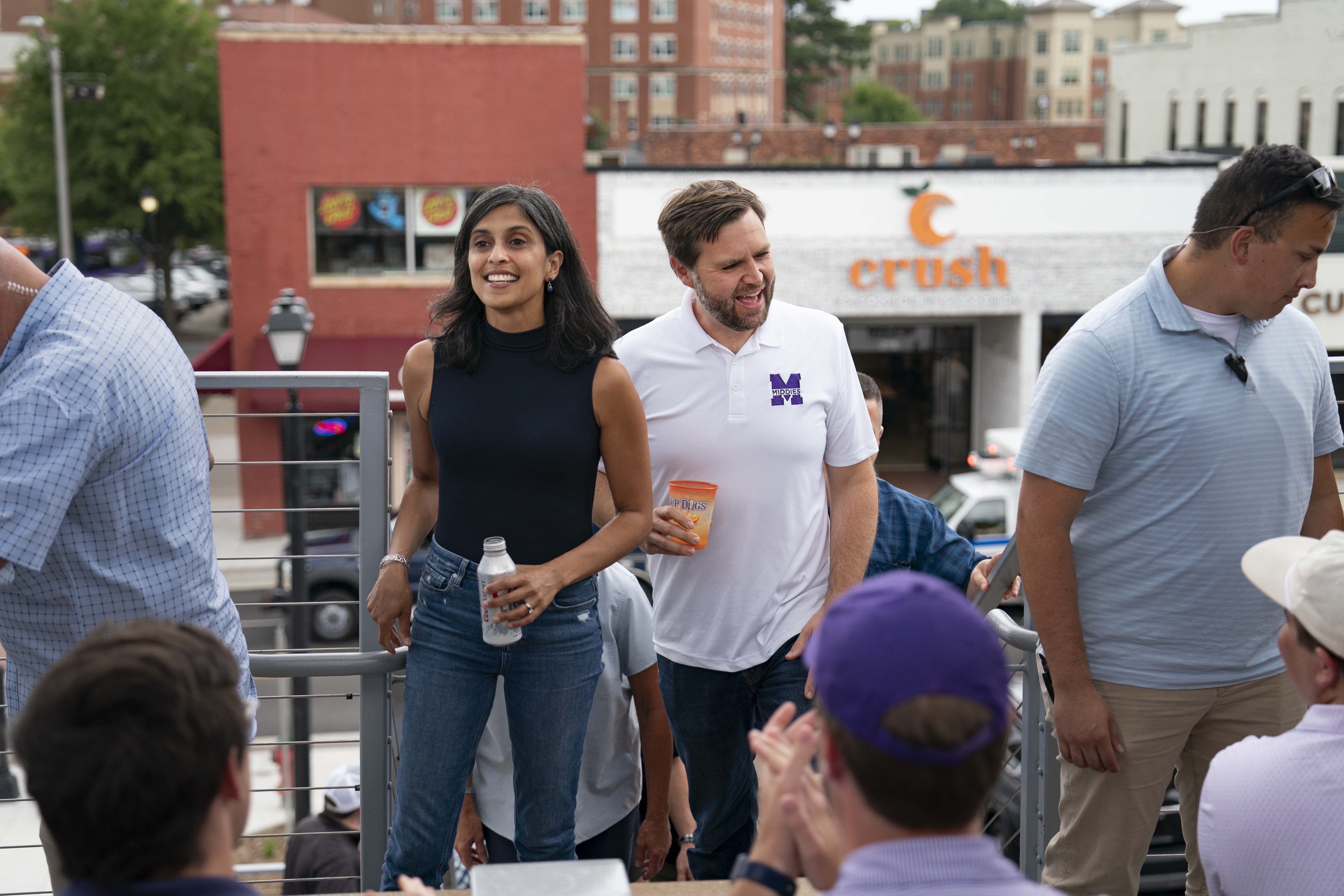 Then-nominee for Vice President, Senator JD Vance and his wife Usha Vance talk to patrons at Sup Dogs restaurant on September 14, 2024, in Greenville, North Carolina | Source: Getty Images