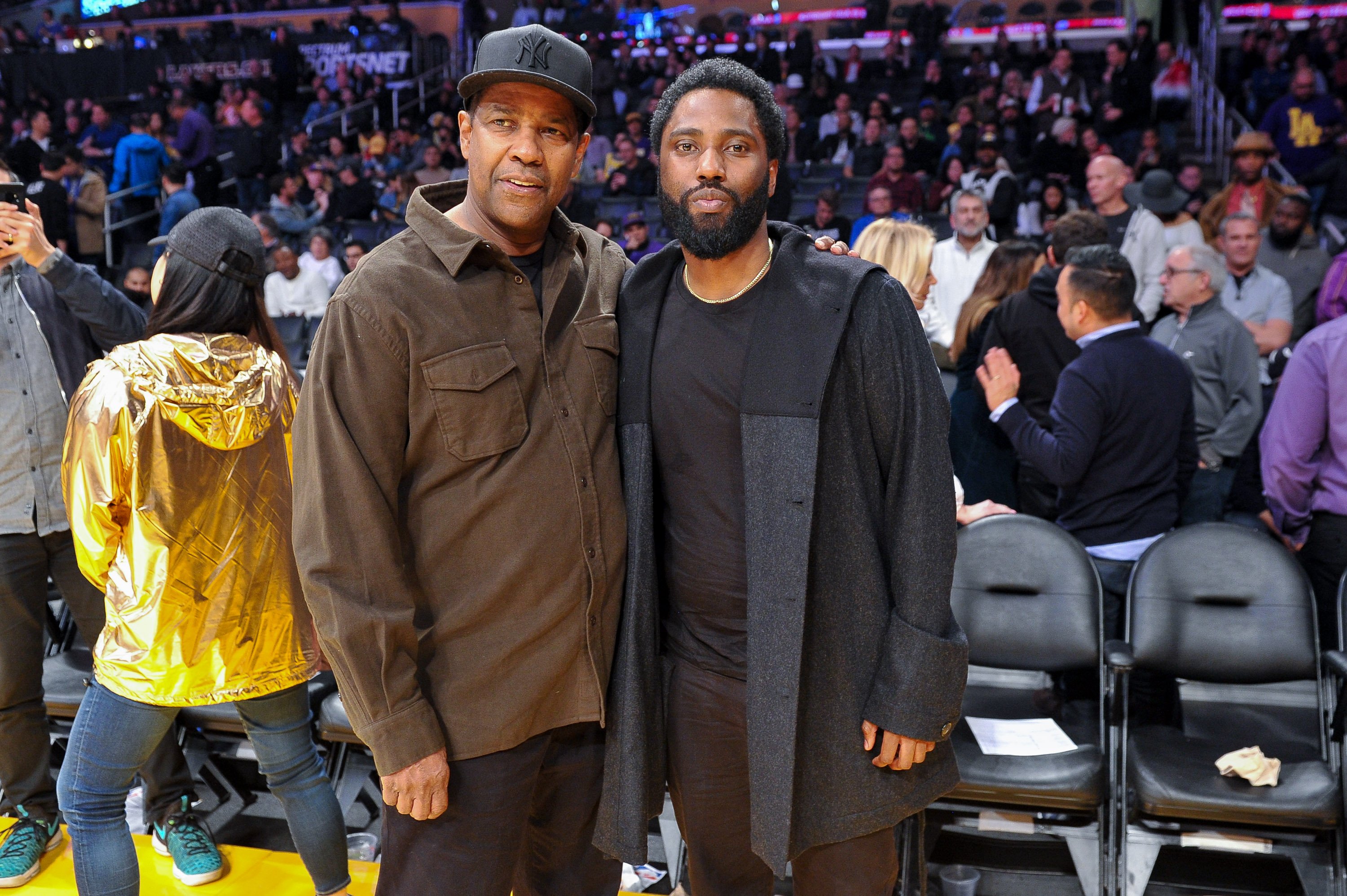 Actors Denzel Washington and son John David Washington attend a basketball game at Staples Center on December 5, 2018 in Los Angeles, California ┃Source: Getty Images