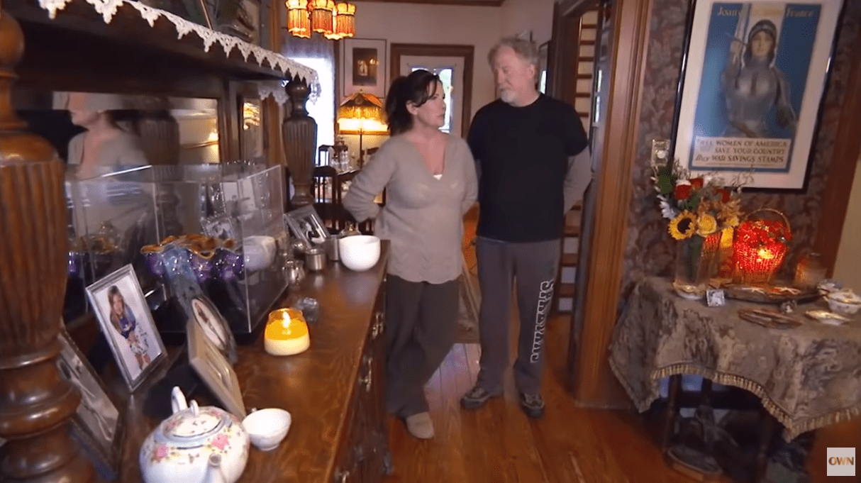Melissa Gilbert and Tim Busfield captured with both their hands behind their backs. | Source: YouTube/OWN