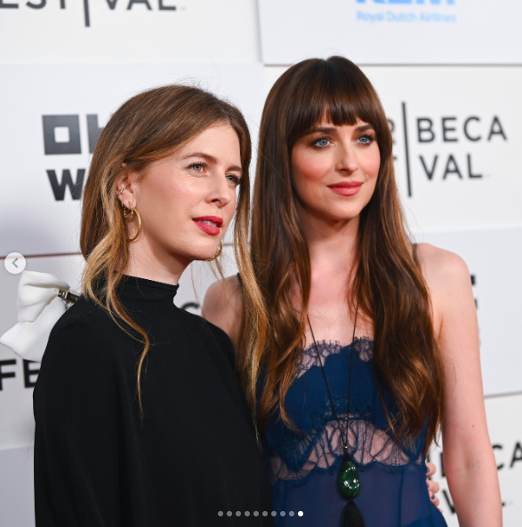 Ro Donnelly and Dakota Johnson posing for a picture at the Tribeca Festival, posted on June 11, 2024 | Source: Instagram/tribeca